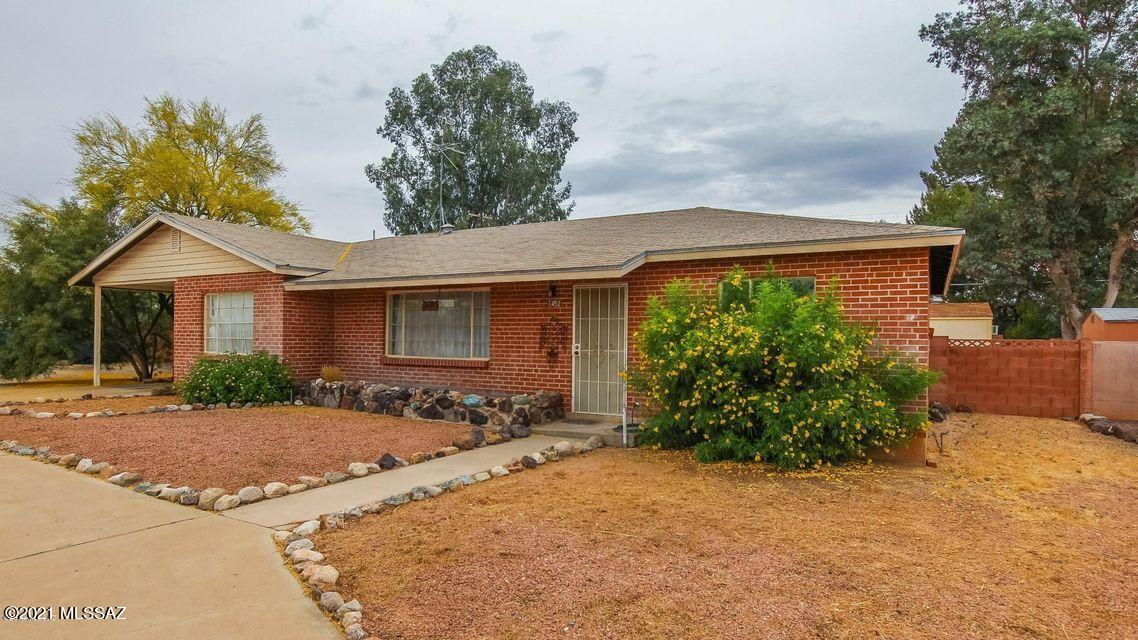 Beautifully remodeled 3 bedroom home.  Entire home is tastefully updated with a new trending palette and new plank flooring (no carpet).  Brand new kitchen boasts of new stylish white corian counters, new SS appliances, & new custom cabinets. New energy efficient windows throughout. Huge outdoor space includes 2 storage sheds/workshops. Large add-on can be used as a private office, or a family room!   Convenient location offers quick access to Shopping, Restaurants, Davis-Monthan, Amazon, UofA, and more!  Come take a look!