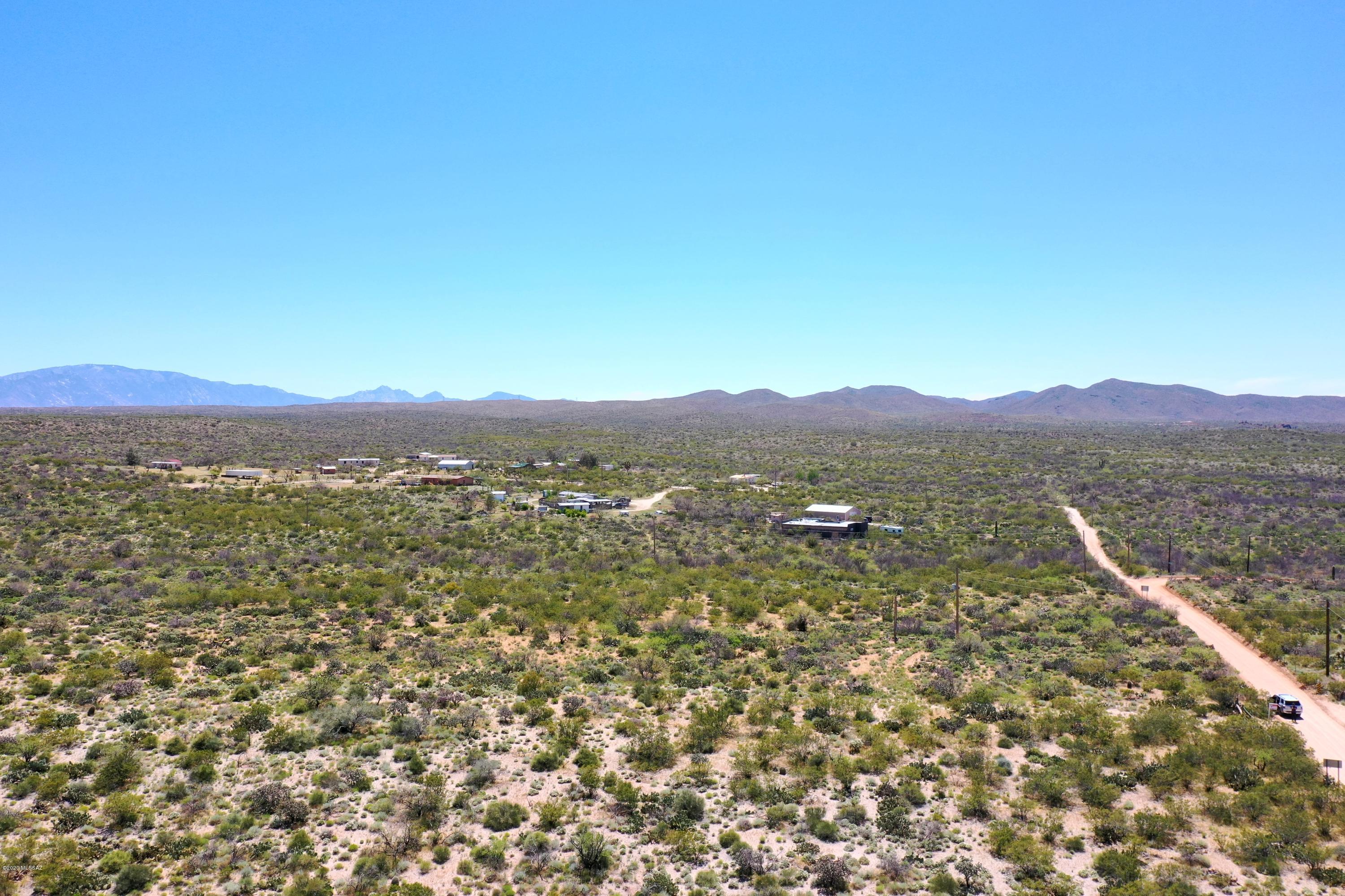 9.77 fenced-in acres with a private well, ready for a manufactured or site-built home!  This land is flat, usable, and zoned for horses so you can start building your own homestead today. County maintains the road for easy access, and the property is only 15 minutes from the nearest grocery store so you can enjoy rural living without sacrificing convenience!