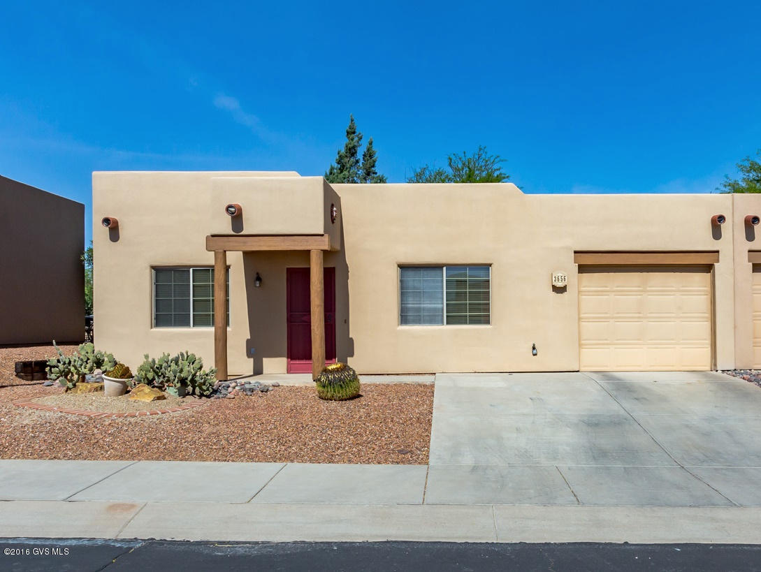 Looking for an inexpensive way to escape for the winters? Or perhaps a rental property near the new Green Valley Hospital? This will do it - a tidy townhome with mature landscaping in the gated community of The Springs. Tile floors throughout and open floor plan. A terrific location within walking distance of the Santa Rita Spring Recreation Center; access to walking trails; and community parks. A real find!