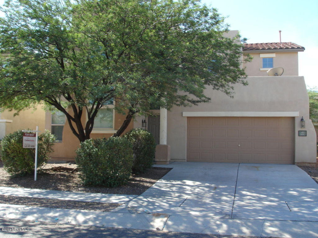 Beautiful Rancho Sahuarita community, lifestyle for the whole family! This 4 bedroom 3 bath is bright, airy and spacious. Master bath with vanity and large walk in closet. High ceilings, 3 bedrooms upstairs and one bedroom downstairs. Community pool/spa, tennis, exercise facilities, beautiful lake, parks and lots more to enjoy!