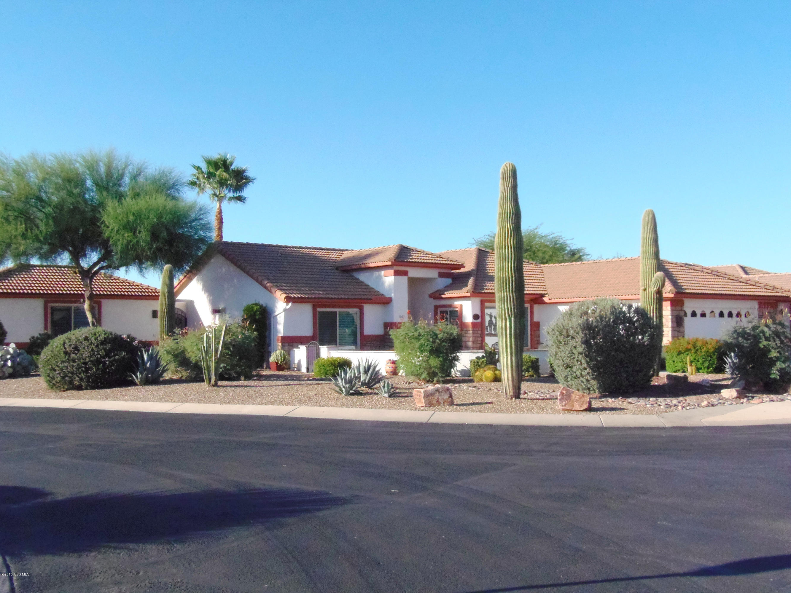 One of a kind! This home has the extras you want! Four foot extension on the main house, separate 419 sq.ft.guest house/casita w/ kitchenette & full bath, 3 car garage, bay windows in both bedrooms, jetted tub in guest bath, full length covered patio, front courtyard, updated windows & doors, split floor plan master suite w/oversized walk-in closet, den/library w/custom built-ins, sound system inside & out, mountain views & there is more! All of the appliances will remain with the property. Better than buying neweverything is ready for you to move in!