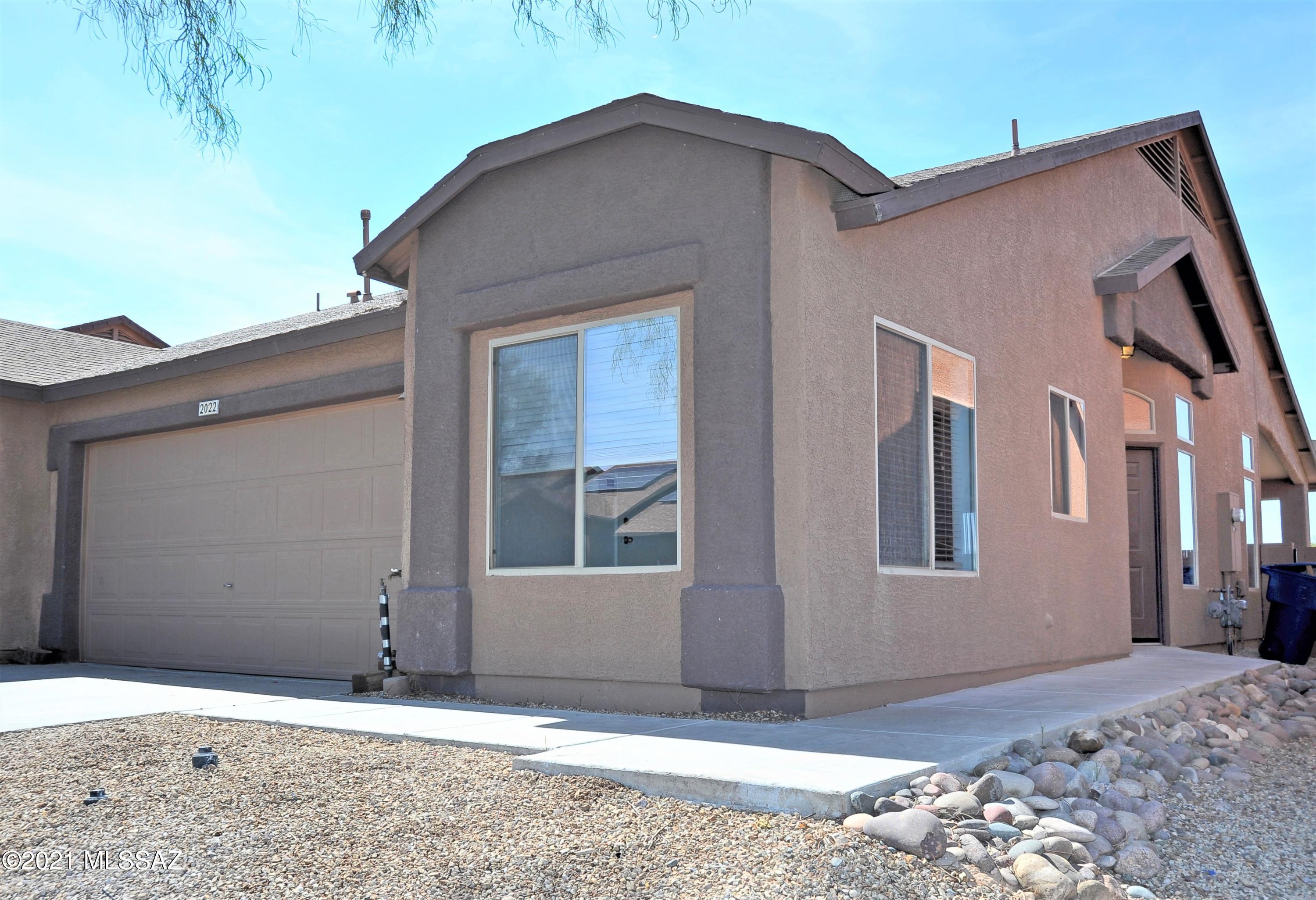 This townhome is move-in ready, features only 1 shared wall, and no rear neighbor! Located a short drive to Tucson International Airport, the Kino Sports Complex, Davis Monthan Airforce Base, and close to all amenities. A New HVAC system installed approx. 6mo. ago offers peace of mind as we enter Tucson's hot summer months. The 2 car garage also allows your vehicles a reprieve from Tucson's heat! The previous owners even installed a water softener, and a Reverse Osmosis system can be found under the sink so you can source your own fresh drinking water. No rear neighbor provides added privacy and visibility to the open space behind the home! The community's walking/jogging path is easily accessible. Affordable, well-located, and ready for new owners!