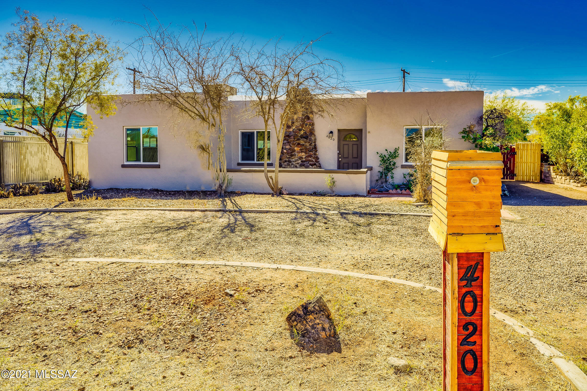 Do not wait to see this amazing property nestled in the well desired subdivision of San Gabriel. Build the life you want close to everything and anything with this tastefully done, detailed, and immaculate home with all the charm of  classic Tucson. This home boasts a new AC, beautiful stainless-steel appliances, granite counters, high end ceramic tile, new carpet, a neutral earth toned color palate, cozy wood burning fireplace, a stained concrete front porch, spacious backyard, a large driveway for visitors, storage shed and so much more. This vintage home is near Reid Park, U of A, concerts, golf, tennis, walking/biking trails, Edith Ball pool, and the Zoo. The new owners can enjoy being so close to shopping and entertainment. and the best part NO HOA! Best hidden gem neighborhood !