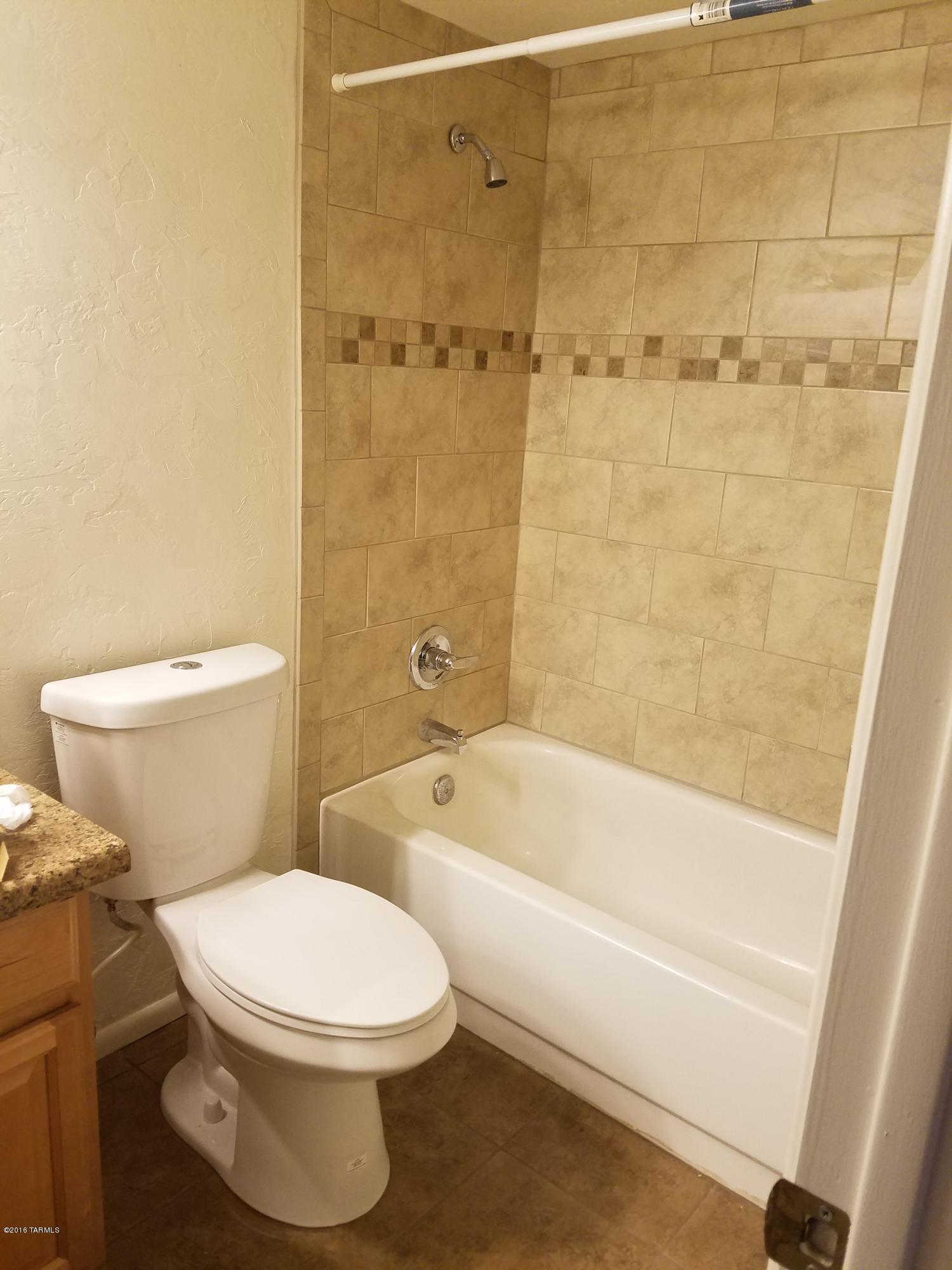 NEW NEW NEW! Come check out this recently refurbished first floor, one bedroom one bathroom condo. This place has new flooring throughout. Remodeled kitchen with new cabinets, counters, and a built in microwave. The bathroom has a new tile tub surround, new tile floors, and a new vanity. The small patio is accessible from both the kitchen and the bathroom; it also has direct access to the pool. This is a pet friendly environment; dog and cats welcome. This unit stands out from the rest with a brand new air conditioner! Property is close to transportation, shopping and dining. This place is a steal with water and trash covered!