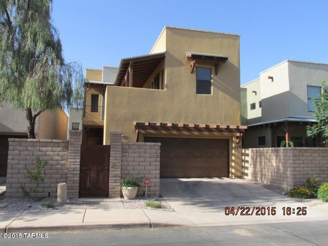 This Gorgeous Home is a 4 Bedroom 4 Bath with multiple upgrades throughout. It shows like a masterpiece and has a private guest suite with it's own entrance. An exclusive community that is gated and very private. Close to the river walk and shopping, dining, and the U of A.