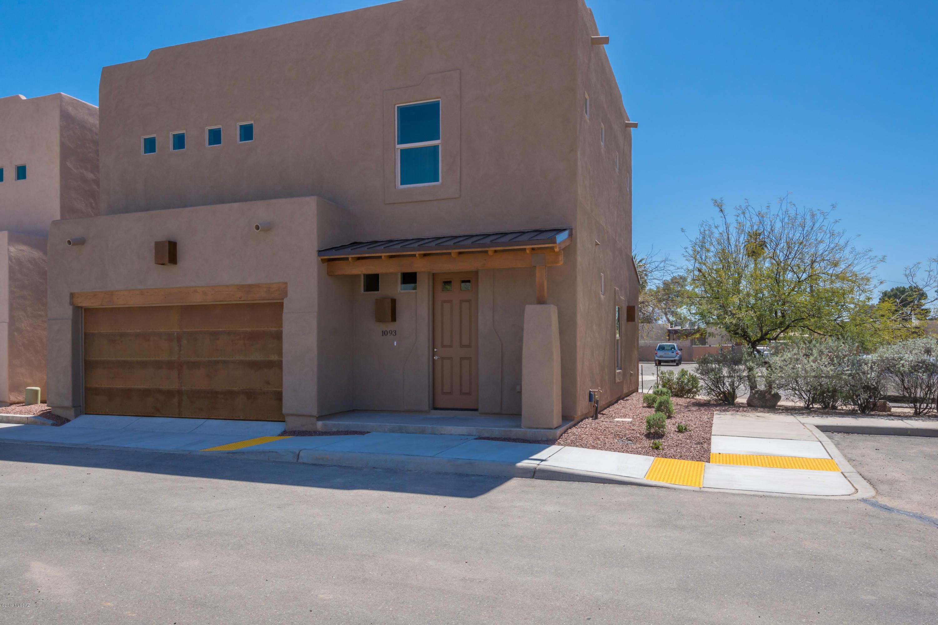 NEW CONSTRUCTION in CENTRAL!!! Stunning New 3Bdr 2.5Bth Homes nestled in a cozy enclave of 10 homes at the end of a quiet cul-de-sac just minutes from U of A, Mountain Ave's bike corridor, Banner UMC, Campbell Ave's Cafe's and Quaint shops, the Riverwalk & all the activities downtown Tucson and the University have to offer! Solidly built by KCR Development, these homes have 2X6 construction and are loaded w/ energy efficient features and high end appointments such as granite counters, 2nd story walk out balcony, soft water loop, 8'entry door, 2 car garage w/ rusted metal doors - ALL INCLUDED in the list price. Move right into this home or 1093 next door Or choose one of 4 premium lots remaining w/ unobstructed Catalina Mt. views and sit with the builder to customize your own new home!