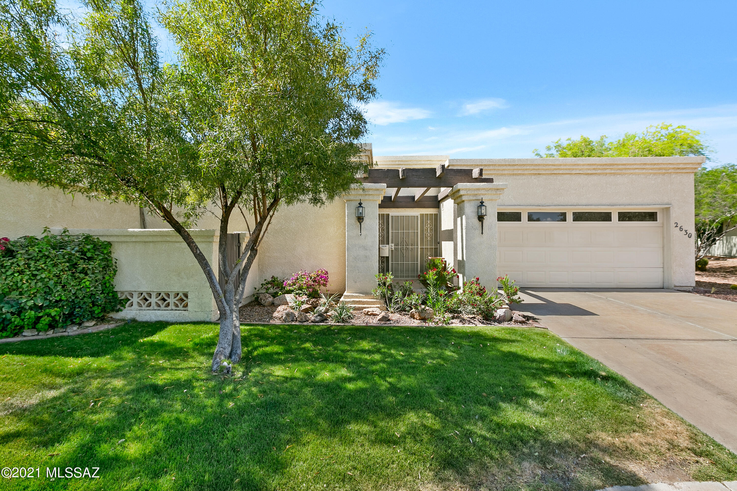 Amazing opportunity to get into such a beautiful place, there are not many sales in the neighborhood! This 2 Bed and 2 Bath townhouse features updated lighting and updated tile flooring where you need it. Granite slab countertops, stainless steel appliances, and cabinet pull-outs in the kitchen. Notice the matching granite slab in both bathrooms and a master with a walk-in shower and separate tub. This townhome also has a perfectly located wood burning fireplace in the living room. HOA covers trash and front yard. Amenities Include Pool, Spa, and tennis court.