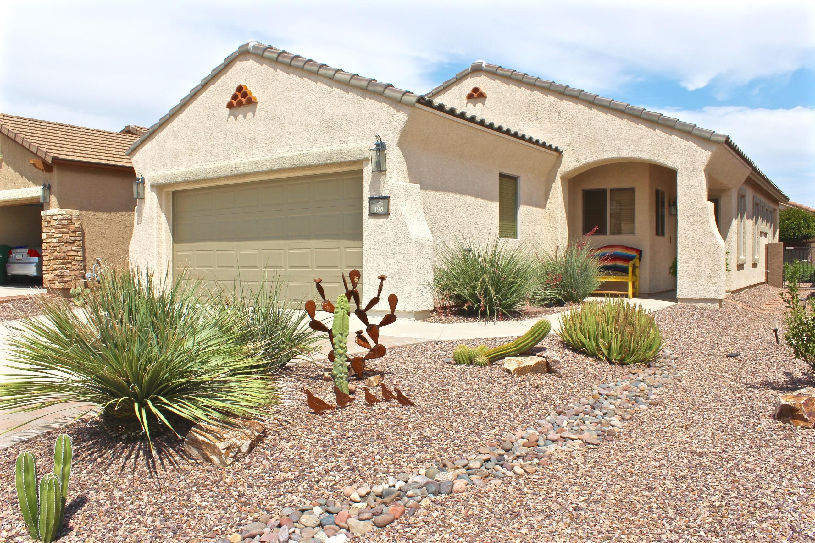 Sonora Del Webb is packed with ways to discover new things and find new friends. This quaint home is in excellent condition and has a pop of color to add a little pizzazz to each room. Enjoy the view of the neighborhood from the corner kitchen sink; you'll like the corian counter tops for easy clean up and a dining area that looks out to the great room. The master bedroom has a beautiful bay window for added space. The master bathroom has dual vanity sinks, a walk in shower, and a walk in closet. Tile flooring everywhere except in the bedrooms. Enjoy a leisurely evening at sunset out on the extended patio with flagstone pavers, listening to the refreshing sounds coming from the water feature. A great neighborhood with a lot of amenities to appreciate. Ready for you to make it yours!