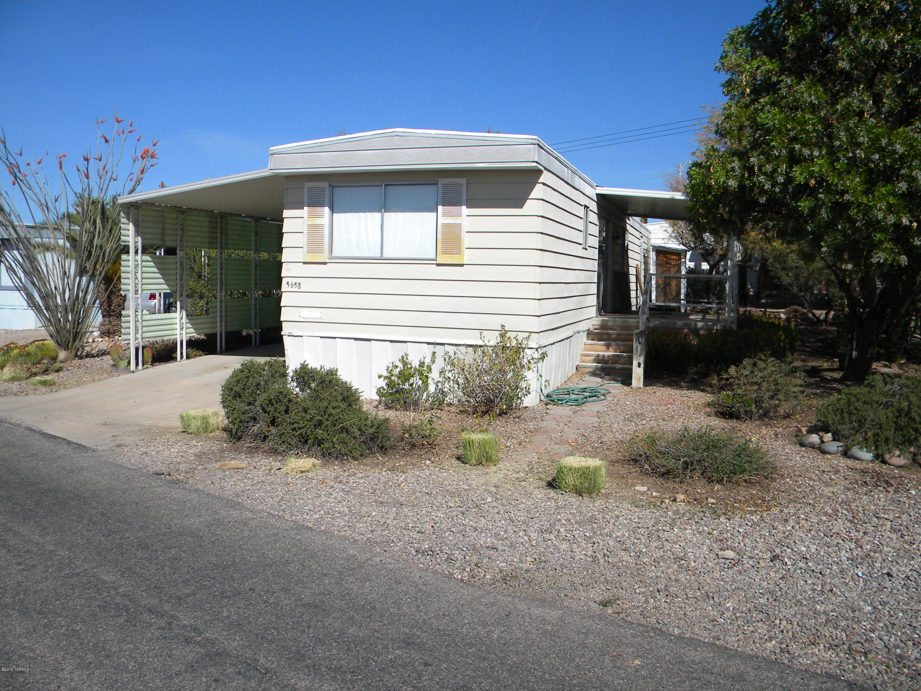 1 1/2 Baths with 2 bedrooms on nice lot. Property being sold ''AS IS''. You can benefit by doing the upgrades!  Community offers golf, 2 pools, club house & planned activities.  Would make a great winter home!