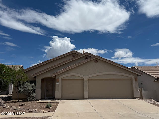Buyer not required to be a VET to assume 2.375% VA loan. Don't miss your opportunity to own this well appointed home featuring financed solar, pebble tech pool w/heater & rock water fall, level 2 EV chrgng outlet, soft water w/osmosis in kitchen, microwave w/air fryer & convection settings.  Got stuff? You'll appreciate  the 3 car garage & storage areas in the house.  Whether it's a souffle or PBJ you will love this spacious kitchen wi/granite countertops & walk-in pantry. Start and/or end your day in a soaking tub!  The primary suite includes a large walk-in closet, separate shower and double vanity.  The flexible space of the great room provides numerous options to suit your lifestyle.  A large living/dining area could become game room!. Solar payments $190/mo. TEP $26/mo. Safe  conveys
