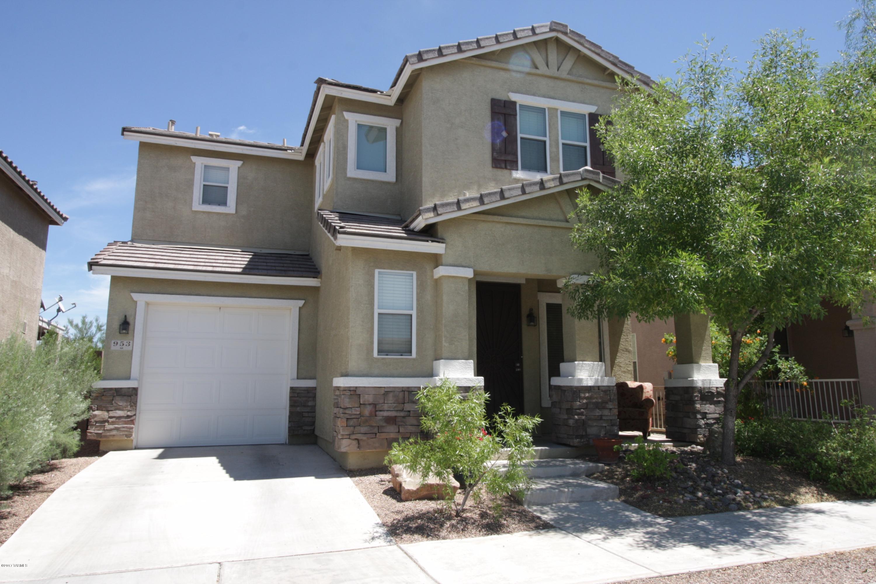 Newer, modern home on Premium Lot in Pantano Overlook providing outstanding views of Tucson's eastside.  New carpet, paint and plumbing fixtures. Open, split level floor plan. Ceiling fans in all Bedrooms. Convenient access to the Loop as well as schools and shopping. Move in ready! All Appliances included.  Owner / Agent Occupied.