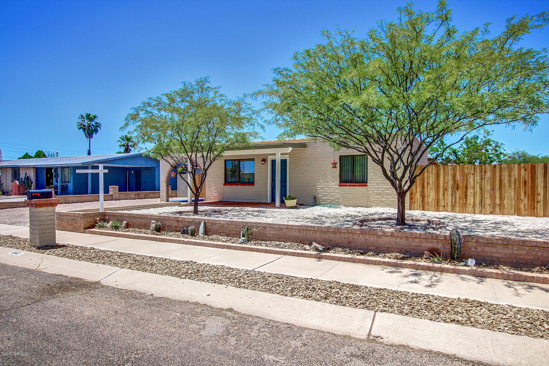 Your search is over! Fantastic newly renovated 2 bed 1 bath home in a great Tucson location! Wonderful floor plan with a neutral color palette including the designer paint tones and tile flooring. Eat in kitchen boasts custom cabinets and ample counter space. Large laundry room has plenty of  cabinets for any extra storage needs! Both spacious bedrooms have plush neutral carpeting. Updated bath has a tile surround shower and upgraded sink hardware. Relax under the covered patio that overlooks the generous backyard that is ready for your personal design! Don't miss this hidden gem! Discover it today!