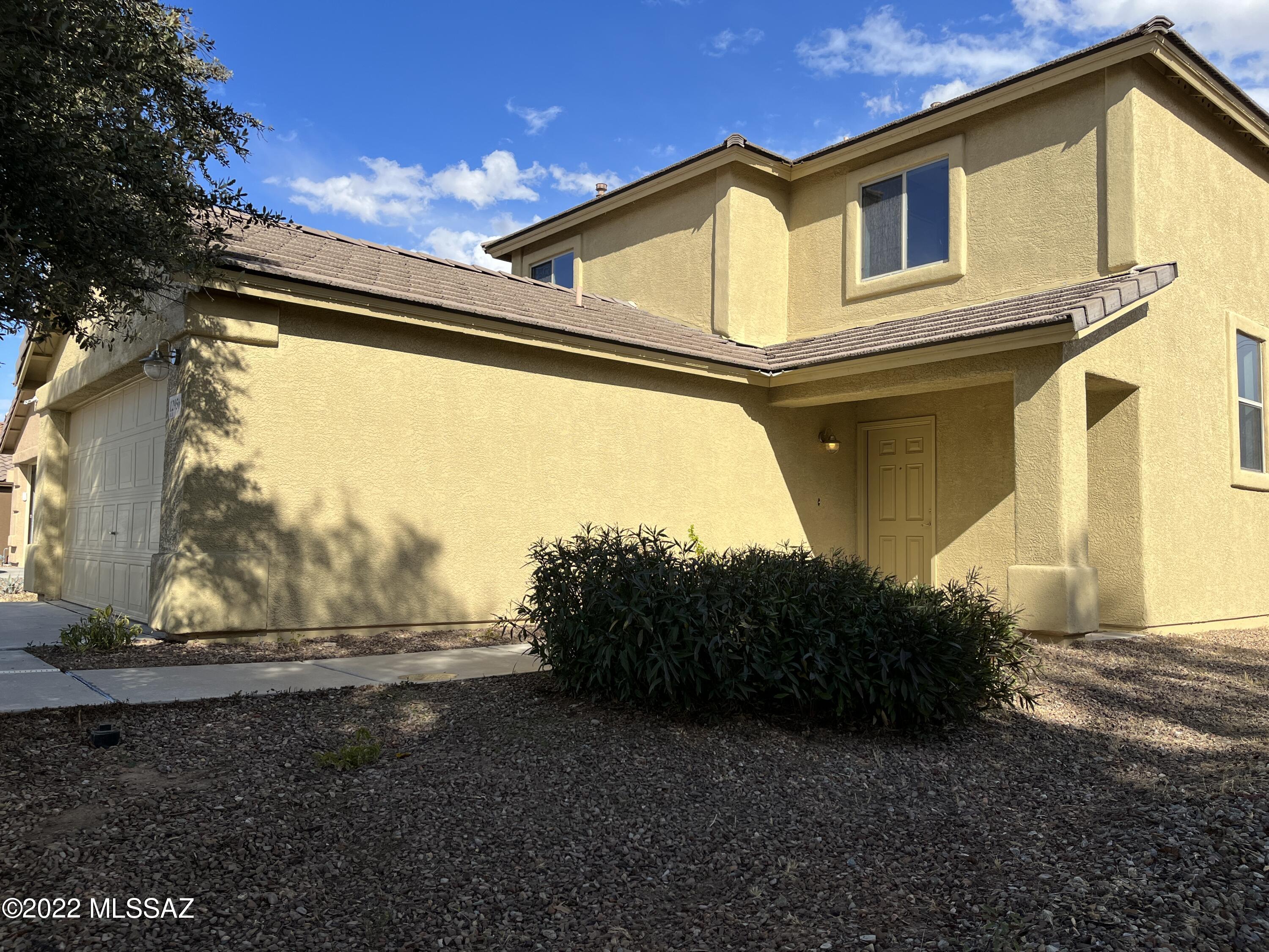 Welcome to this Gladden Farms- 4bd/2ba home with no neighbors behind. The layout includes the primary bedroom downstairs, and the other 3 bedrooms are located upstairs with a large loft area that boasts great mountain views that overlooks the backyard. The primary bedroom includes a walk-in closet, and its bathroom includes a new tub/shower and toilet.  Newly painted inside and ceiling fans throughout.  Good sized kitchen with ample cabinet and counter space. Large backyard includes a covered patio with an extended patio slab, gas hookup for any future use, nicely sized grass area, raised planter beds and a soil section that was recently tilled and is ready for your home garden.