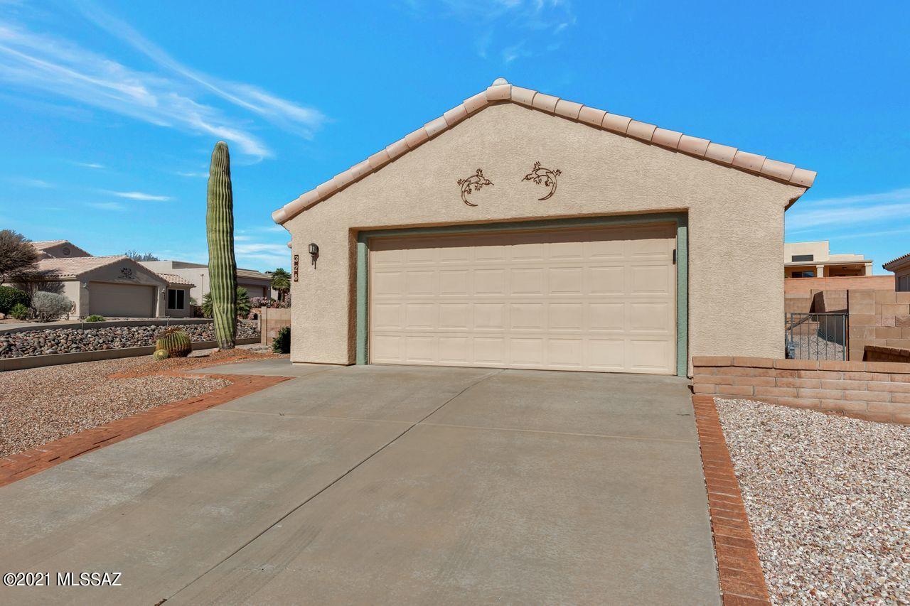 Lovely home needing just a little T.L.C.
Master bedroom has a spacious dressing area with duel sinks and a large walk-in closet. Very nice size guest room with hall bath near by. There is a small room for office or den. The kitchen opens to a large living area plus there is a kitchen eating area. Near front entrance you would have a formal dining room. Laundry is in garage just our side the door. Most of the windows have been replaced and the roof redone in 2018.  Enjoy a covered patio and a large tiered back yard.