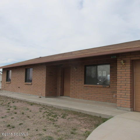 Ranch style, block constructed, 3 bedroom 2 bath family home on hilltop lot in East Rio Rico. Concrete driveway to top of hill. Needs some TLC so don't miss this opportunity. Lots of potential!!