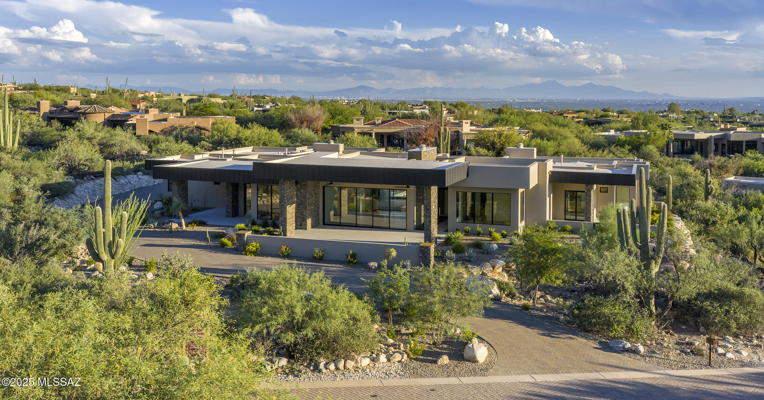 New Construction Modern Contemporary Custom Built home within the secondary gates of Pima Canyon's most coveted enclave of Pima Gardens. This Modern Contemporary masterpiece, designed  by Kevin B. Howard
Architect. Built by master builder  John Matalone of Riviera Homes, LLC.  Built with only the quality materials and attention to 
details that you would expect in every aspect of this magnificent custom home.  John Matalone's  44 years of home building 
experience are evident in all the details such as interior 5/8''drywall throughout home, high density insulation, custom made interior 1 3/4'' solid core rift cut oak doors and  Engineered Brazilian wood porch ceilings. Exterior Dryvit Stucco and many other custom features. Owner/Agent