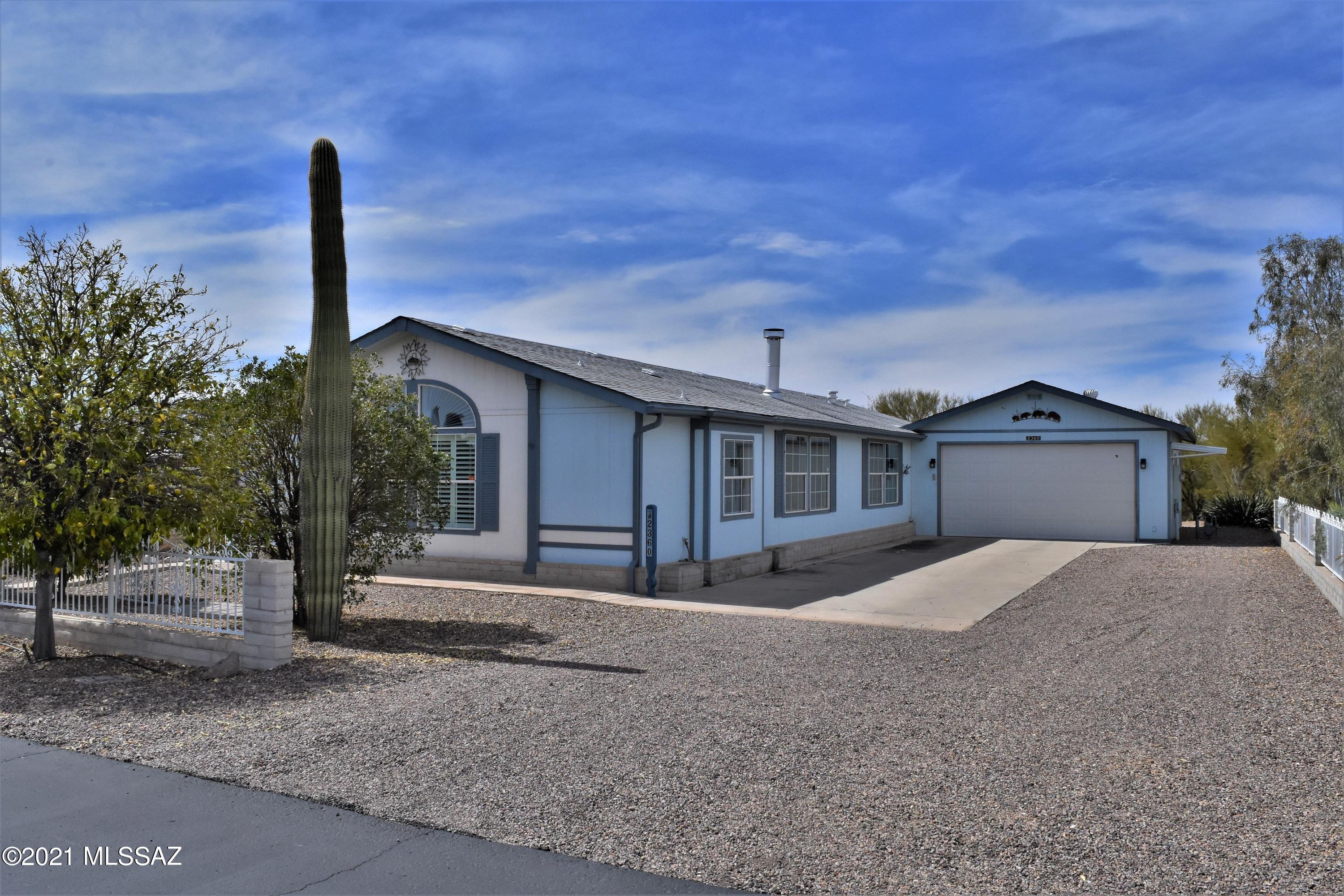 Charming 3-bedroom, 2-bathroom home with a split bedroom floor plan and gorgeous mountain and sunset views with an extended 2-car garage. Situated in the desirable Tucson Estates No. 2. Bright and open floor plan makes the home very inviting. Spacious kitchen overlooking the formal dining area and the see-through fireplace. Resort style master bedroom and master bathroom with elegant finishes. Relax in the master bedroom, or master bathroom in the newly installed freestanding, soaking bathtub. Arizona Room includes floor to ceiling glass sliding doors recently installed, maximizing views for your enjoyment and new flooring. Home is move-in ready and comes furnished! Home is not located in age restricted community.