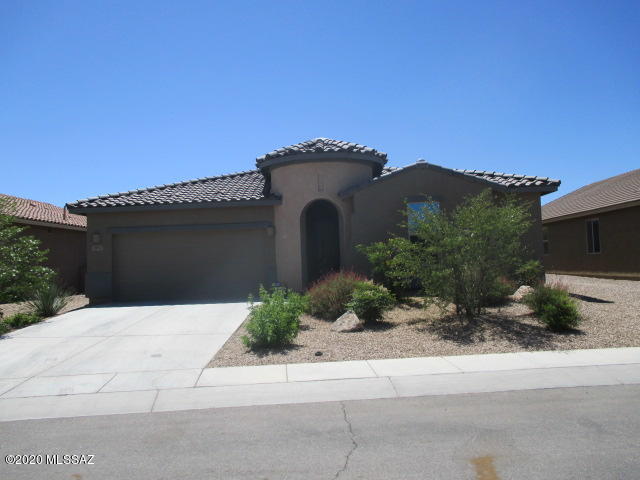 Better than new! Dramatic entry hall to the large great room. Gorgeous cooks kitchen with a huge island the upgraded cabinets feature pull-outs. Large laundry room with front load washer/dryer. Covered patio with a pool sized back yard or enjoy the community pool. Super clean, move-in ready, superior quality home built by Meritage.