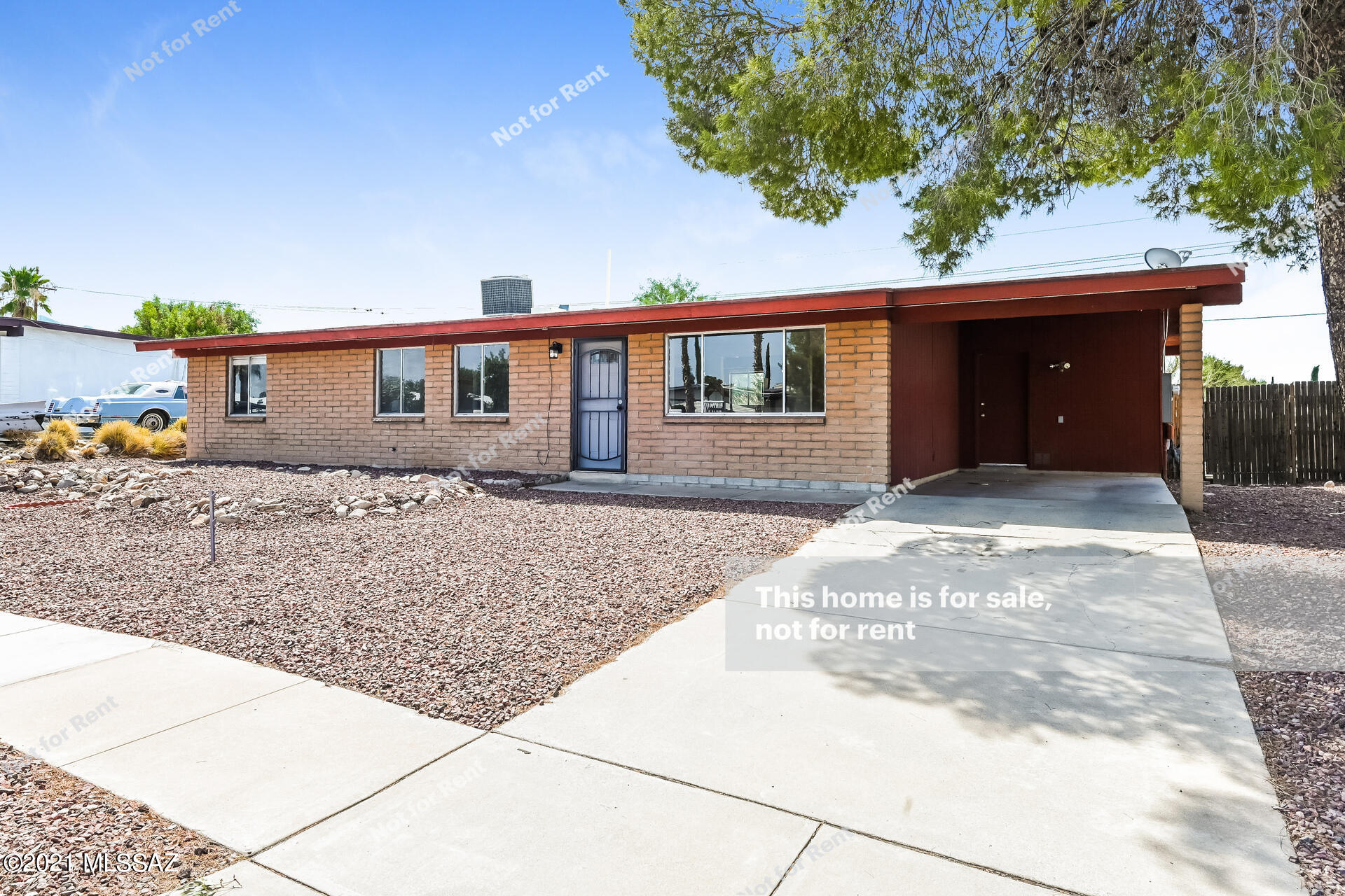 This Tucson home has one story. This home has been virtually staged to illustrate its potential.