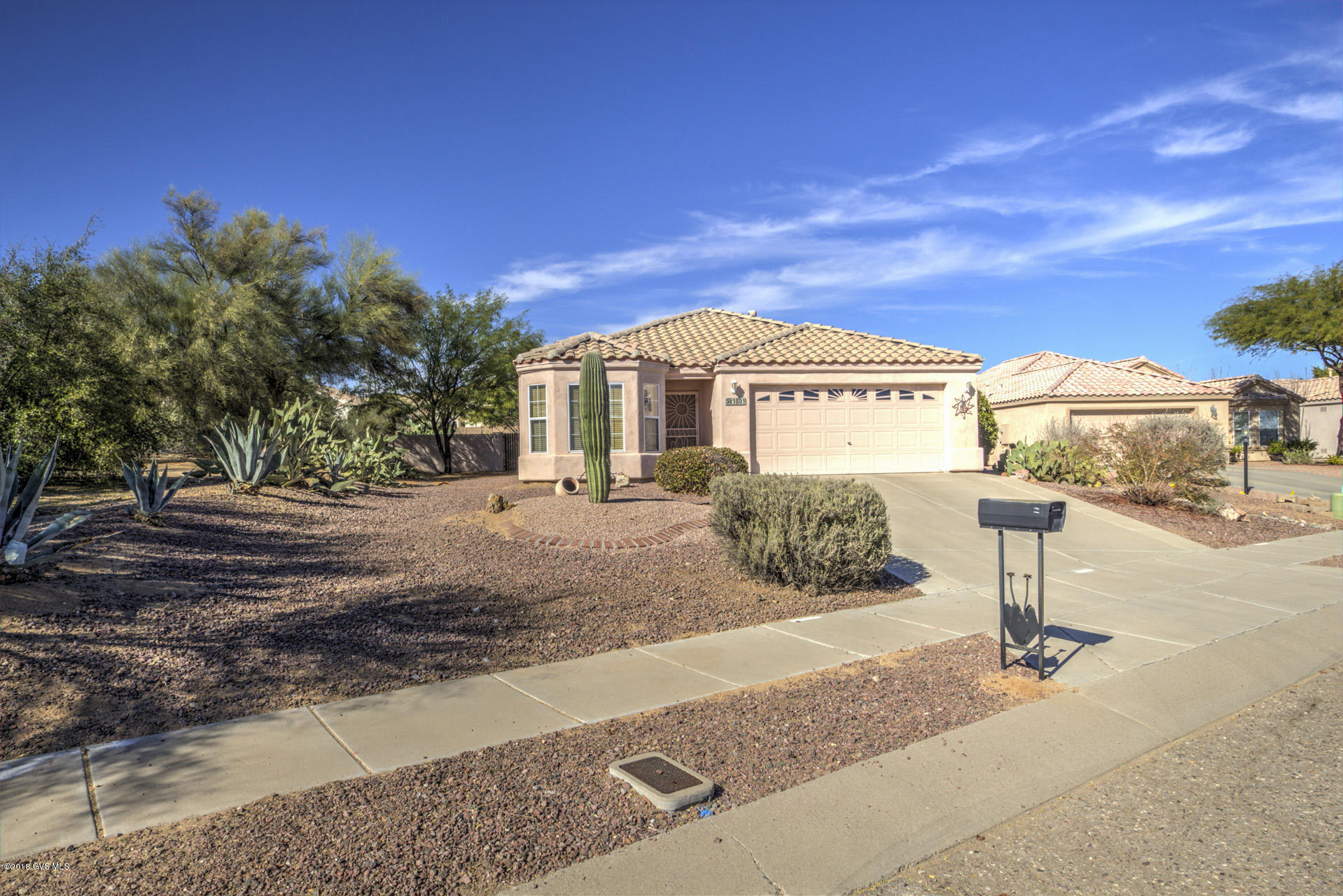 Well maintained 1631 sq ft home with 2BR/2BA, Den & an enclosed room off the Great Room. Garage has built-in-cabinets. All appliances are 2 yrs old. Home sits on .32 acres and has a VERY private back yard. Lots of room to roam and close to all of Green Valley's amenities. SBOS for furniture.