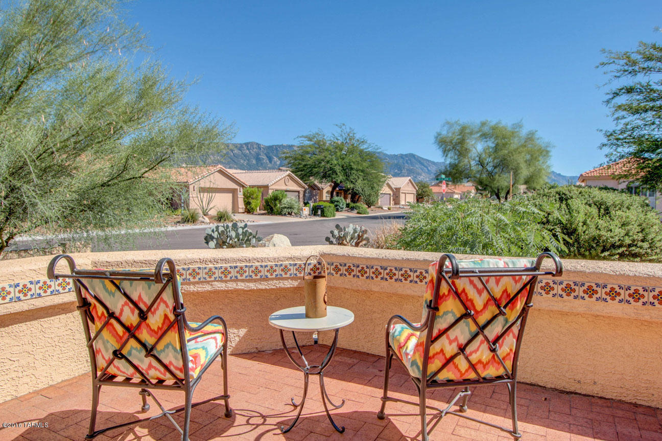 Ultimate entertainer’s house! PLUS versatile oversized gst house, hobby house, wkshp, theatre, your choice..full BA, mini-kitchen, built-in storage creating unlimited opportunities. Highly upgraded & gorgeous great room Laredo w/amazing custom features. Double French doors in brkfst nook lead to serene, mtn view crtyrd. French doors at great room, see thru fpl. Show-off kitchen w/stainless steel appl’s, WOW Gas range, dble door pantry. New deluxe carpeting, engineered wood flooring, designer ceiling fans & lighting thru-out, den w/built-ins. Unbelievable Master BA. Extended garage + golf cart garage, storage cabinets, sink, attic ladder, hot water recirc, electronic furnace filter. Full length cov’d patio, extended Ramada, lg water fountain, kiva fpl, BBQ, spacious brick open patio.