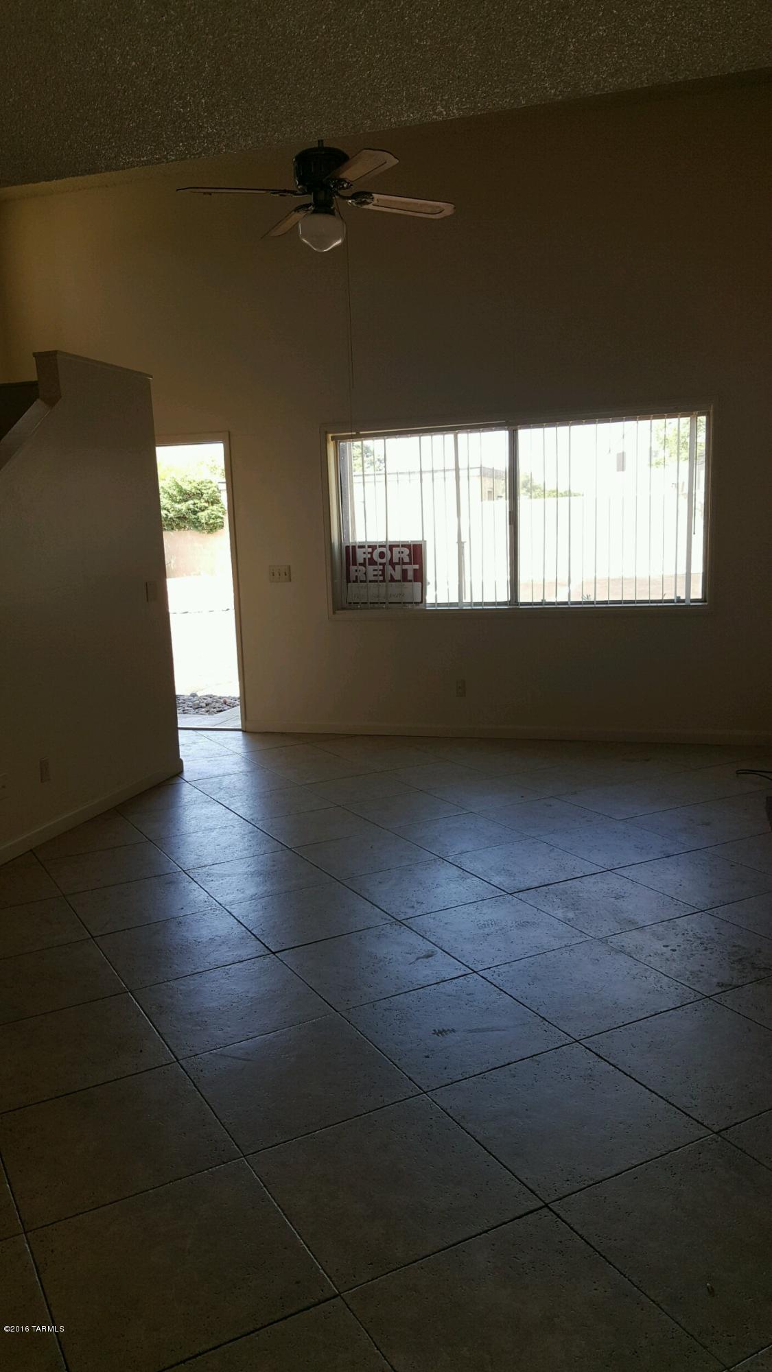 Newly remodeled 2 story townhome, centrally located. Updated and move in ready. Extra large laundry room with full size washer and dryer. Wood burning fireplace for those chilly winter nights. New carpet and paint plus a new A/C for the summer! Private fenced patio area. Two pets maximum considered. Community pool, rent includes trash and water