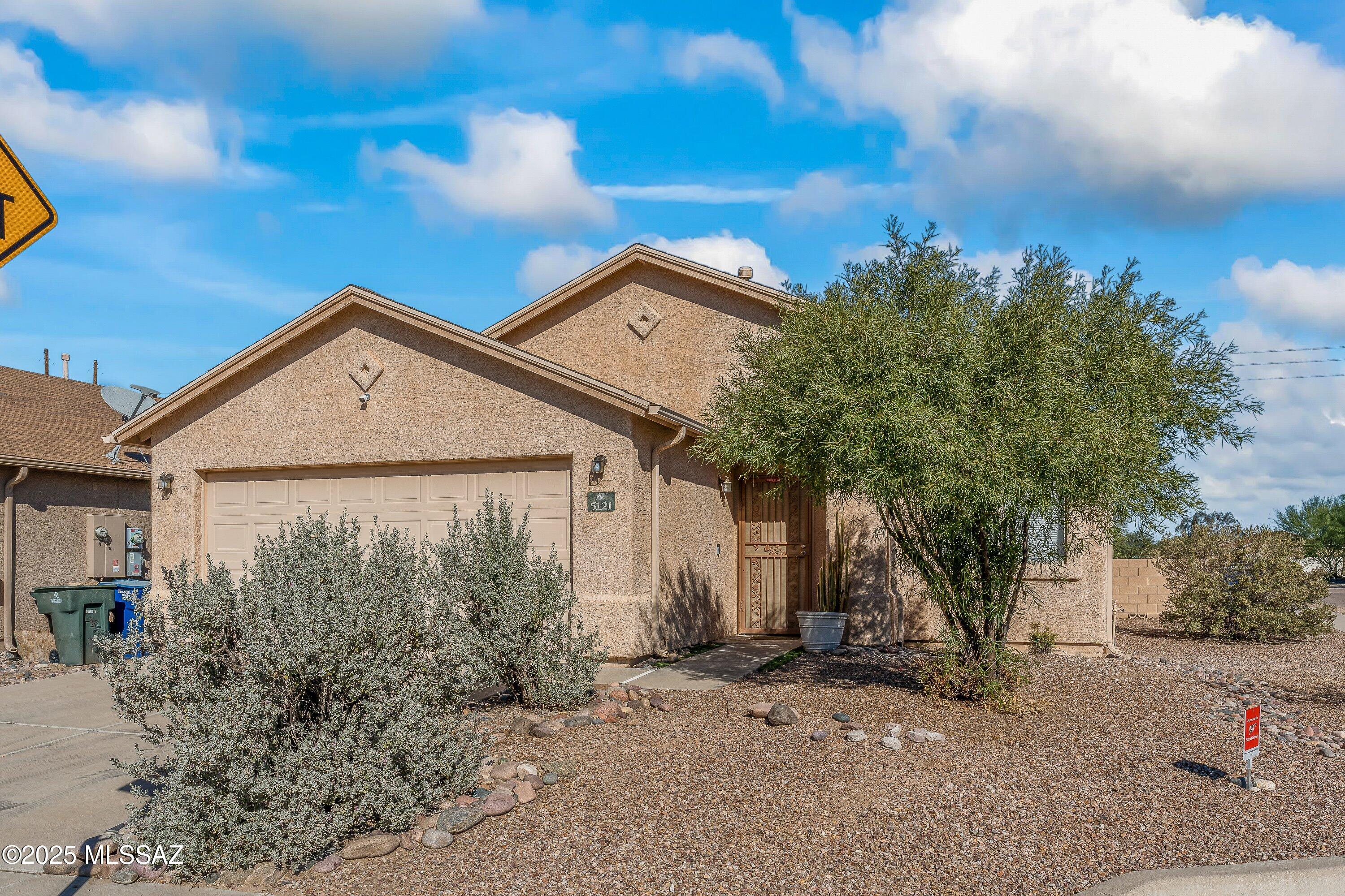 This great Reszi home is on a corner lot in a cul-de-sac with lots of upgrades. Spacious 3 bedroom, 2 bath home. Vaulted ceilings, and great floor plan. No carpet in the living room, kitchen, and bathrooms (22-inch tile). Spacious kitchen with island and lots of cabinet space. The laundry room is off of the two-car garage. The backyard is a Gardner's dream, with a large covered patio and storage shed. No neighbors behind or to the side make it a super private house tucked into a great neighborhood. Newer AC and solar panels. Conveniently located near I-19 and shopping centers. Schedule your showing today!