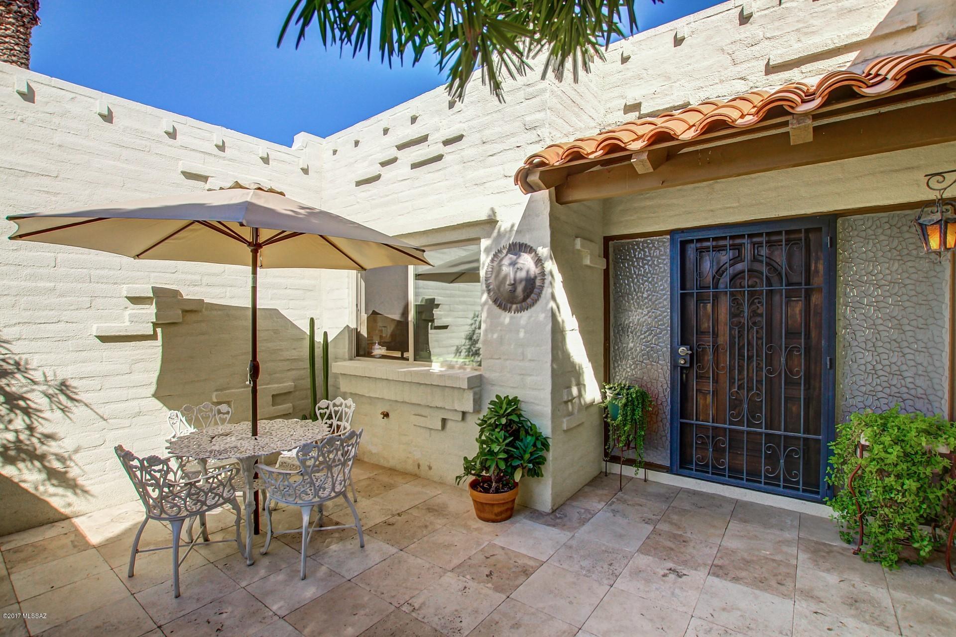 Newly remodeled townhome nestled in the heart of Colonia verde. This desireable community features two pools, light paved walking paths, clubhouse, and beautiful views. The home features new travertine, custom vanities with granite and oversized bedrooms with huge closets to accommodate even the biggest wardrobe.  Separate den with fireplace can be used as an office or studio. Generous cabinets, pantry, and dual storage rooms offer a place for everything. Front and back patio have travertine pavers and sunset views. Low maintenance landscaping and plenty of room to entertain, what more could you ask for? Water included in HOA fees.
Agent is related to sellers.
