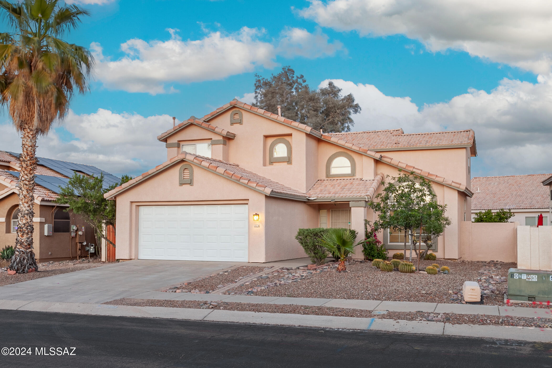 Check out this beautiful two-story home, perfectly situated just short walk from nearby schools. It boasts a landscaped backyard complete with a pool and fruit  trees. Inside, find a cozy family room featuring a fireplace, perfect for relaxing. The entire house with granite countertops and well- maintained wood flooring. This home is exceptionally clean and well-kept. Don't miss your chance to see it for yourself!