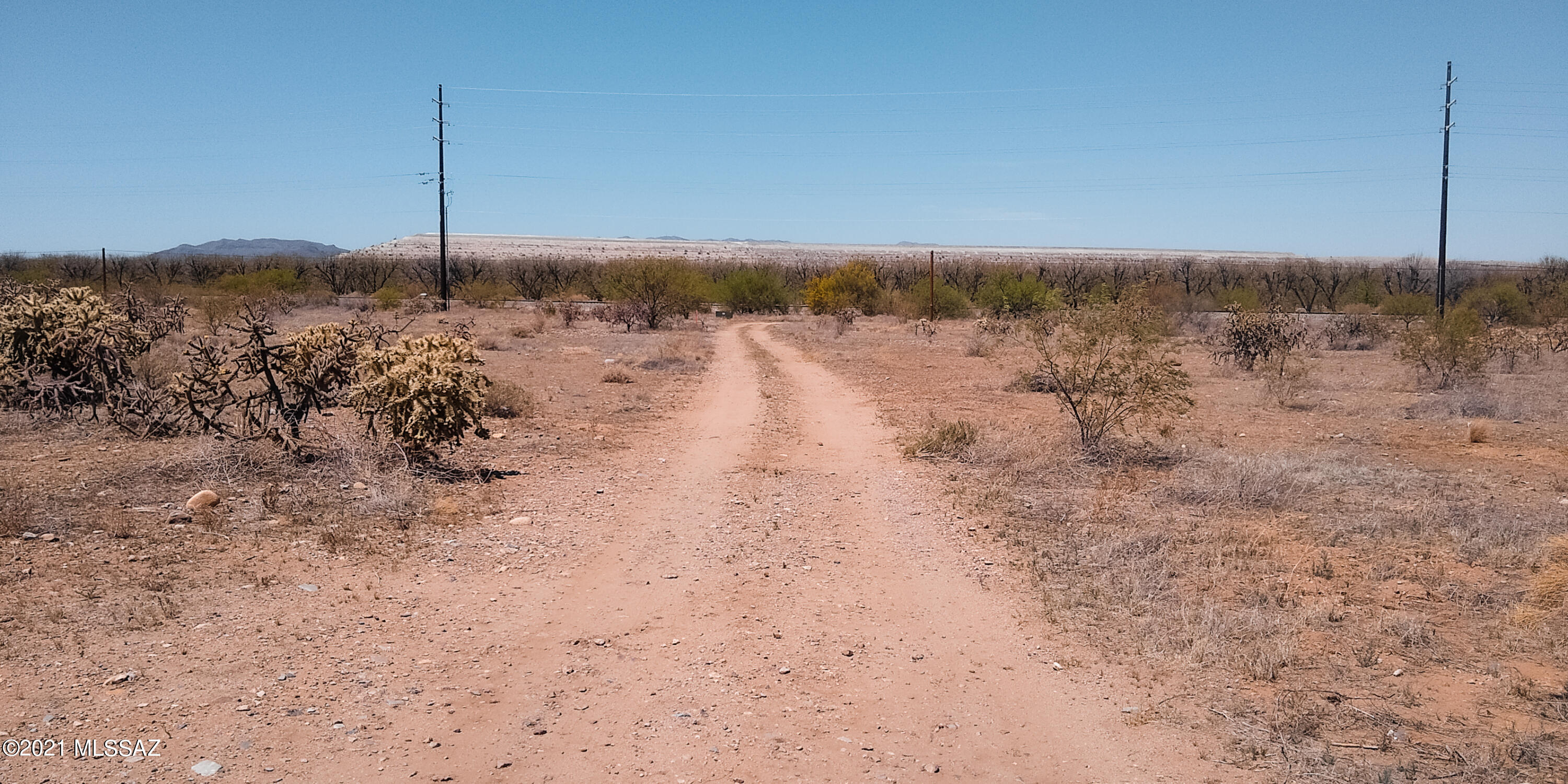 Electric and Water at the property line. Paved road, cul-de-sac, horse permitted property.