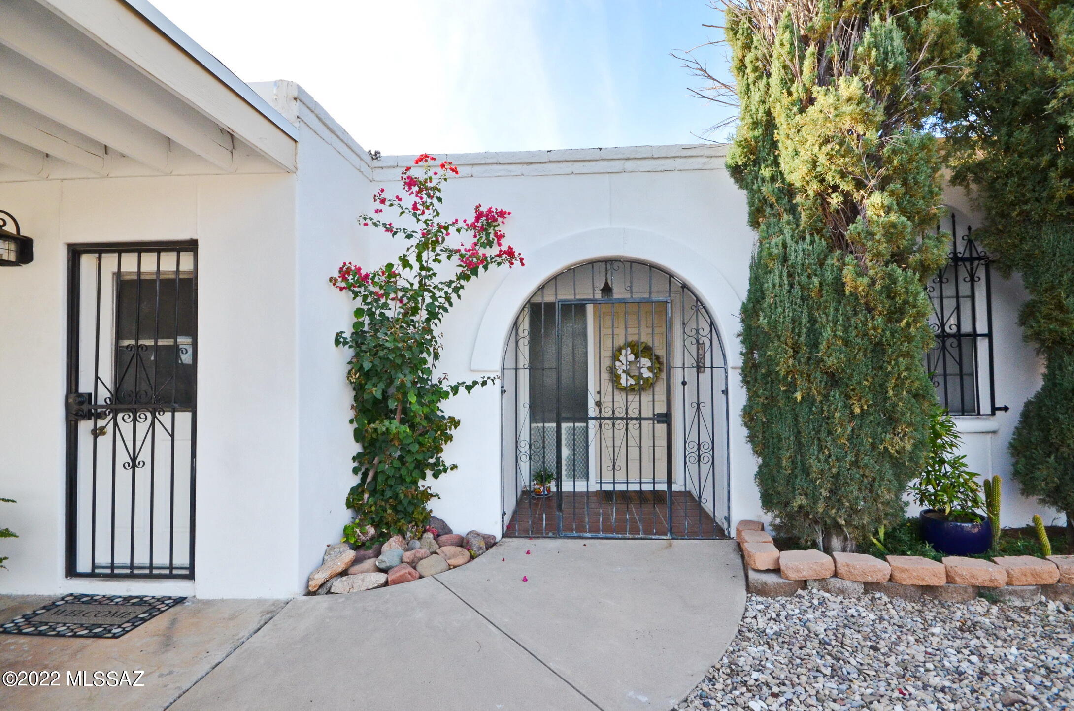 Desirable three bedroom two bathroom home near Rolling Hills golf course on a quiet cul-de-sac. The spacious entry leads to a rear great room and dining room. See the beehive fireplace overlooking an oasis-like patio with pool & a 65' covered porch. This home is very welcoming and well-maintained. Envision your family playing in the pool during the hot summer months and warming up together around the fireplace during the winter. Upgrades include: New roof installed (March of 2022), Newer carpet in the master bedroom and living room, New carpet in the other two rooms (November, 2022) Interior painted, Kitchen cabinet doors replaced, Exterior painted, New pool pump, new tile floors in kitchen, bathrooms, hallway, and laundry room. All window coverings and potted plants to convey with the home.