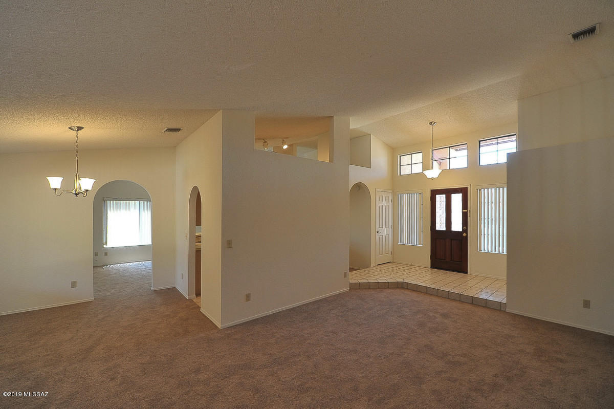 Wonderful large home sits high on a large cul de sac lot.  3 bedrooms, 3 bath.  Master suite has dual sinks, separate tub-shower, 2 closets with double door leading to rear yard.  Living room with fireplace, formal dining area, family room. breakfast bar, ceiling fans in every room, washer and dryer included,  Pool and huge rear yard.  Ask About P#69-Q