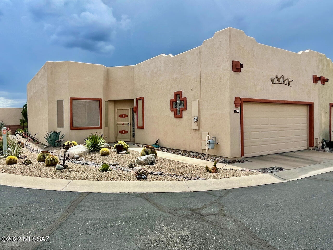 Welcome to this meticulously maintained townhome,! 2 bed, 2 bath, 2 car gar. situated on a corner lot with mature desert landscaping. Inside you'll find tile flooring, tastefully decorated & furnished with a pleasing color palette throughout.  Enter the foyer to the great room with gas fireplace, adjacent kitchen open to the dining area, and breakfast nook. The spacious primary bedroom boasts an ensuite bath with step-in shower and  a walk-in closet. The guest bedroom is equally spacious and would make a great office when not entertaining guests, Step out onto the serene rear covered patio and you'll find your own little oasis with a sense of privacy not usually found in this community, it will certainly become your favorite place to take in a book or a cup of coffee. See list of updates.