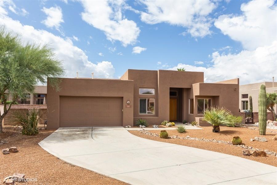 Large corner lot in a gated-community with access to a community pool. Closely located to Stone Canyon. This property features a great room plan with high vaulted ceilings, large windows for natural lighting, and great views of the mountain. The kitchen boasts Granite counters, wine rack, double ovens and stainless steel appliances. Low maintenance landscaping and amazing mountain views from the yard. Seller has HOA approved pool permits!