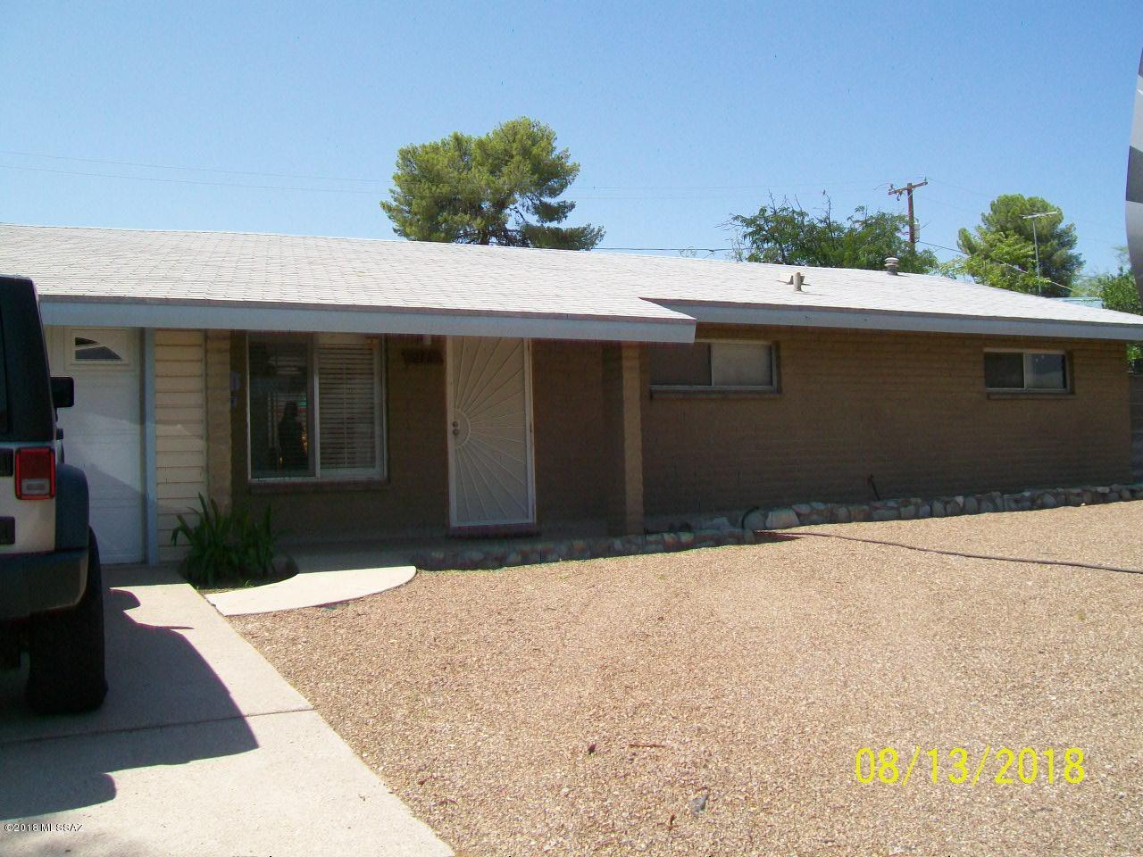 Pride of ownership in every square foot of this home! Interior features: Main living area open and bright. Living room, family room and even a man cave. Remodeled kitchen with stainless steel appliances, laminate & ceramic flooring, bar between living and family room has granite countertop. Exterior features: Block privacy wall, covered front porch, large sun patio in back yard, low care landscaping in front & back yards and storage shed and lighting in back yard