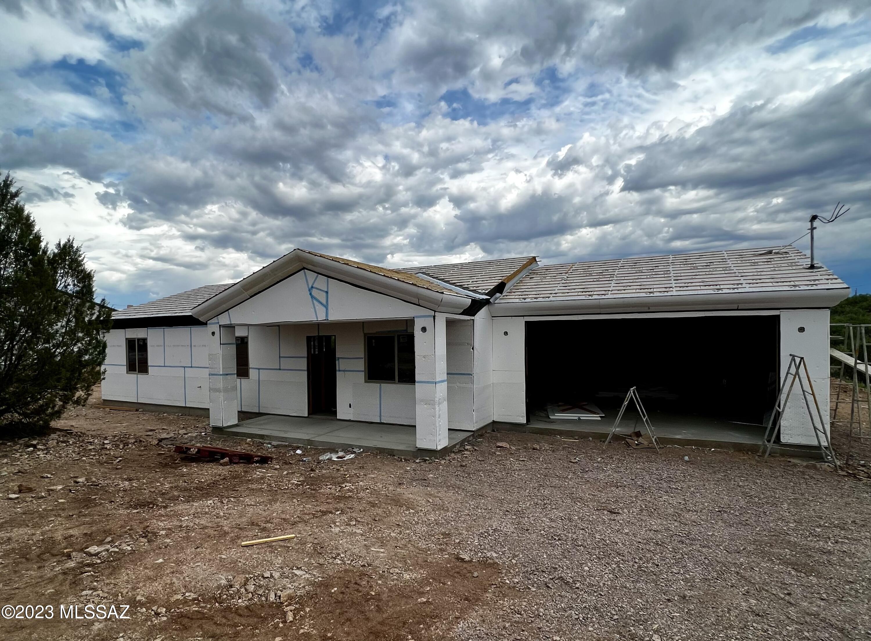 This New Construction is a perfect starter home. The property will feature an open concept floor plan, with vaulted ceilings, ceramic tile through out, ac unit, and  modern light fixtures. The kitchen will have an island, granite countertops, stainless steel appliances, and custom cabinetry. The Primary bedroom will be a very  good size with a walk-in closet. As you step outside to the cover patio, you will notice that the house sits on a usable back and side yard. Come take a look!