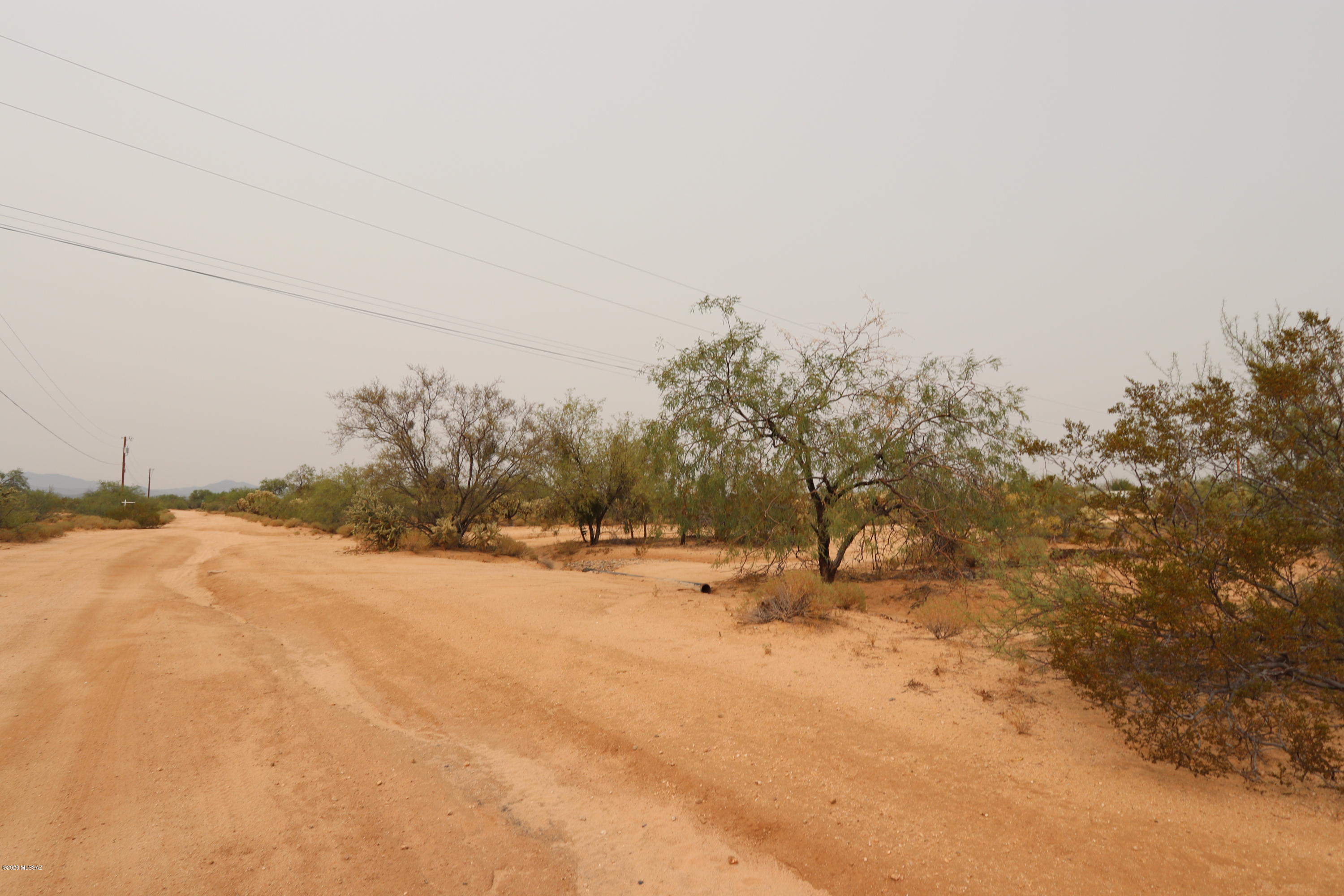 Over one acre corner lot in Diamond Bell Ranch at Three points. Zoning is SH (suburban homestead). Build a single family house, duplex or move in a manufactured home. Electric available. Nice area in Pima County outside of Tucson city limits.
