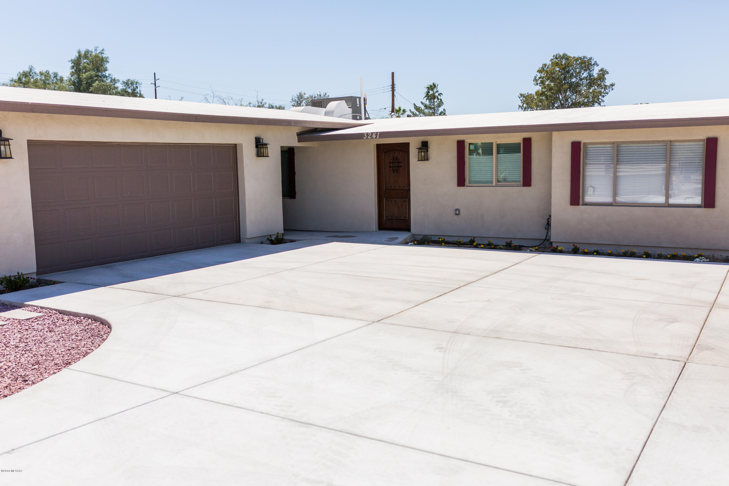 Owner Financing is now available! Only 10% Down and you can be in this home within a WEEK! This totally remodeled home invites you through a private block fence with a beautiful and unique custom auto gate. The all new concrete drive offers plenty of parking with security and safety leading to a huge detached 2 car Garage. Opening the front door reveals all new appliances and amenities tastefully designed with modern finishes as well as energy efficient systems. Very close the the U of A and all points central.
If you want office in your new home this is the property for you, the commercial zoning is ideal for home based Business and this home is built with pride! A huge lot offers plenty of room for parking or a pool. What a Jem!
