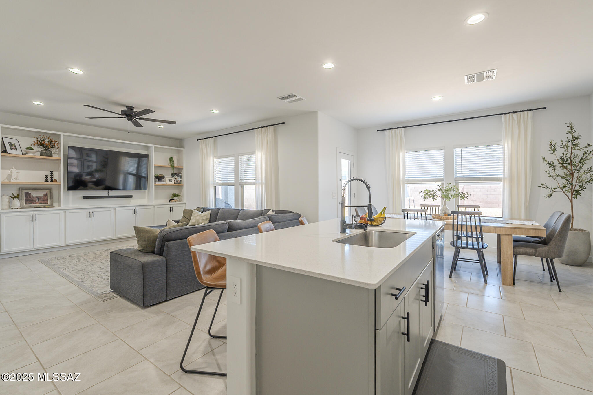 Take advantage of an assumable FHA loan at just 4.5% interest—a rare opportunity to lock in a low rate in today's market! 

Built in 2022, this 4 bed, 2.5 bath home offers nearly 2,000 sq ft of modern living in the sought-after Vail School District. The open-concept kitchen features quartz countertops, a center island, stainless steel appliances, and ceramic tile flooring that flows into the main living areas. A custom built-in entertainment center creates a warm focal point for gatherings. 

Upstairs you'll find all four bedrooms, including a spacious primary suite with a walk-in closet. Smart home upgrades include an alarm panel, smart thermostat, and video doorbell. Energy efficiency comes standard with LED lighting, a tankless water heater, wate r softener, and financed solar panels. 

Located in Hansen Ridge, residents enjoy community parks, nearby shopping and dining at Safeway, and easy I-10 access for commuting. 

Ask about the 4.5% assumable FHA loan and how it can save you thousands over the life of the loan!