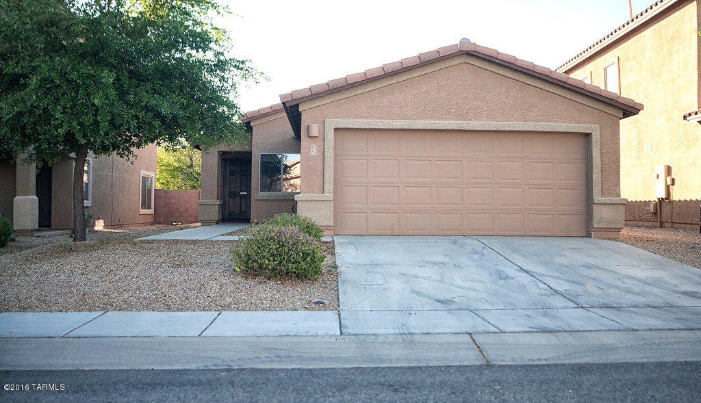 Remarkably well taken care of home. Lots and lots of upgrades on the inside, including lighting, ceiling fans, cabinets, very tasteful paint, windows, new carpet, Mexican ceramic tile, and wood blinds throughout. Home is much nicer than many in the same neighborhood, and offers beauty, serenity, and relaxation! Nothing needs to be done to this home.  All appliances convey, including very nice shelving in garage. Garage floor has just been re-done and is beautiful! Seller is offering a home warranty to the buyer and warranty is still valid from the original builder.