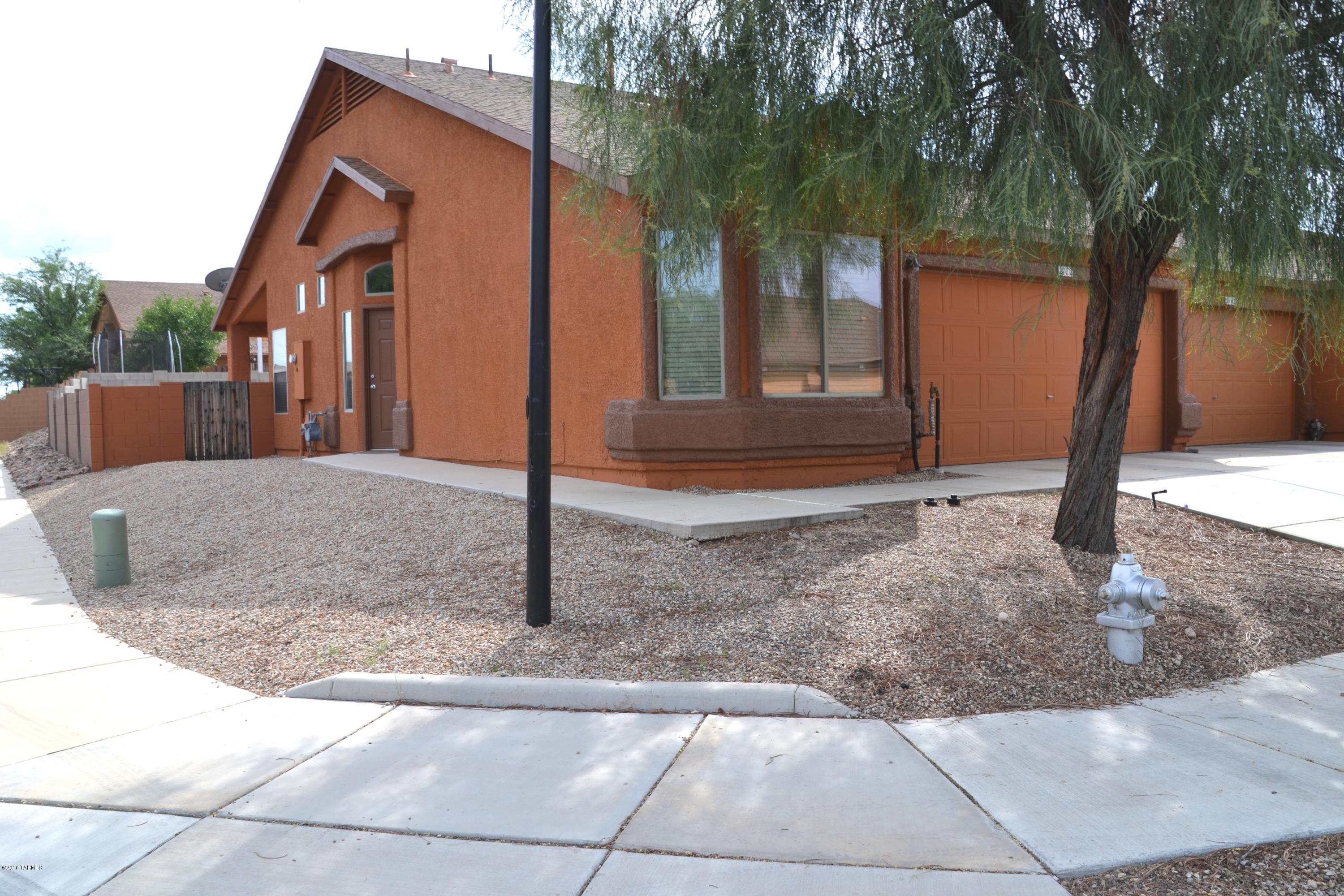 Adorable 2 bed 2 bath Townhome on large corner lot.  Spacious and bright floor plan, high ceilings, and tile in all the right places. Open kitchen with island and stainless steel appliances. Master suite with large walk-in closet.Enjoy all the amenities the community has to offer, park, bbq. area, basketball courts, jogging path and play area.Come take a look!