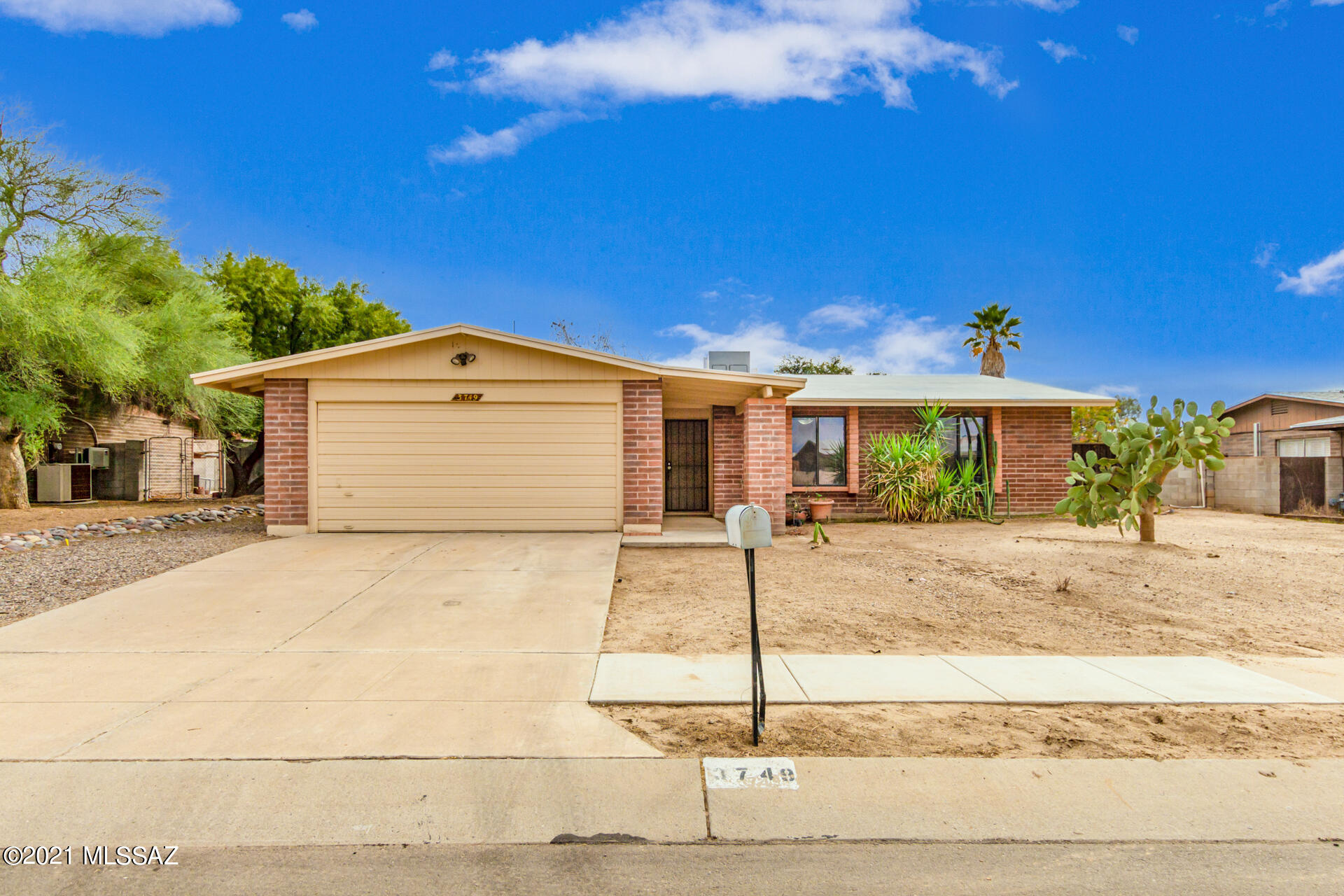 Welcome home to this lovely 3 bedroom, 2 bathroom property. Community has no HOA! Come inside the spacious great room to discover beautiful Saltillo tile flooring, inviting fireplace and natural lighting throughout. The kitchen offers white cabinetry, recessed lighting, and large breakfast bar. Grand main bedroom boasts plush carpet, walk-in closet, and an ensuite with tile shower. The expansive backyard offers a relaxing covered patio, generously sized swimming pool with spa, excellent for all your gatherings. New AC has been installed.