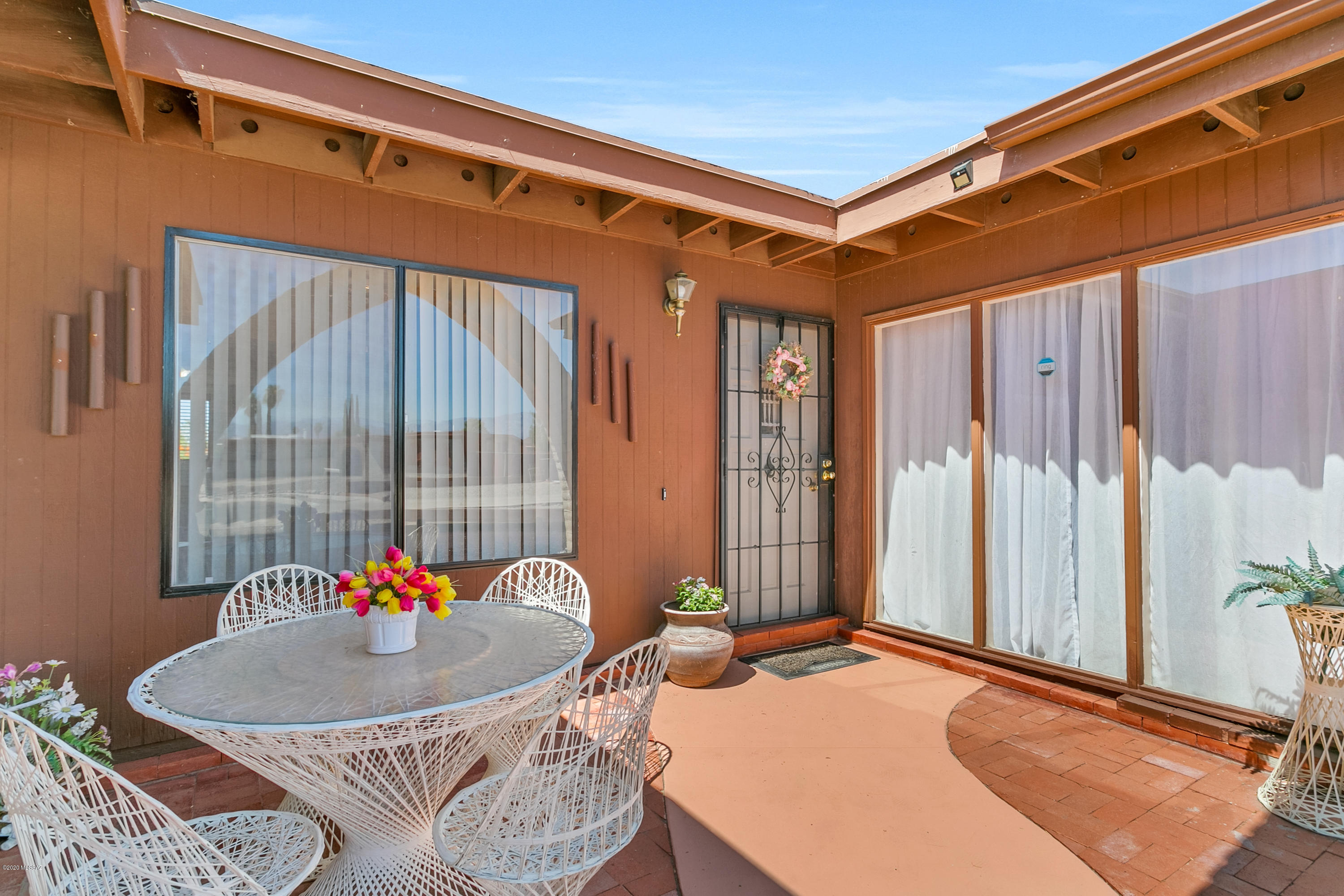 Don't miss this Eastside gem! 4 bed, 2 bath home on large .4 acre lot.  Home features two living spaces (one with a fireplace), all tile flooring, updated baths and tons of storage.  Home has a bonus room with separate entrance, suitable for a home office, game room or guest quarters.  Spacious backyard is perfect for outdoor living!  Features include mature citrus trees, an oversized patio, recently replastered pool, storage sheds and beautiful views.  Space for RV parking available too!  Home has two year new AC, new furnace, new water heater, newly recoated roof.