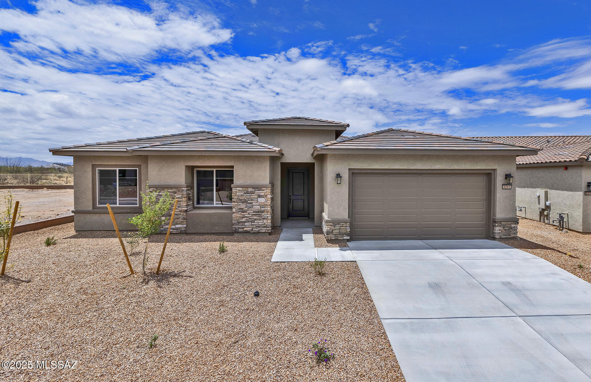 The Pursuit floor plan offers 2 bedrooms, a den, and 2 baths in a spacious design. Enjoy 10' ceilings, a walk-in pantry, a tankless water heater, and gas connections in the kitchen, laundry, and backyard. The owner's suite includes a framed walk-in shower for added luxury.

The kitchen showcases Navy cabinets, quartz countertops, and a chef's stainless steel appliance package. Pre-wired for ceiling fans and pendant lighting, this home is finished with thoughtfully selected design upgrades. The Clubhouse is open.