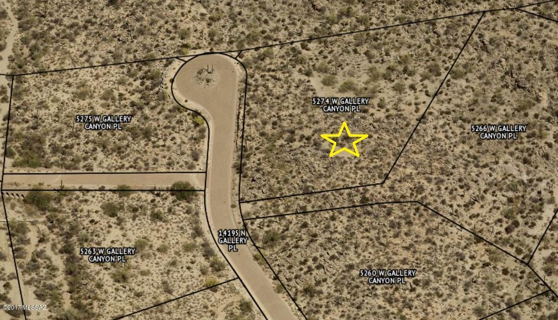 Lot 8 is naturally defined by stands of Foothill Palo Verde trees which create the essence of this native desert setting. The building envelope is situated within the shadows of the hillside, which is blanketed with monolithic boulders and rock outcroppings. Perched high in elevation this lot offers pristine views of the distant mountain ranges and Marana valley below.