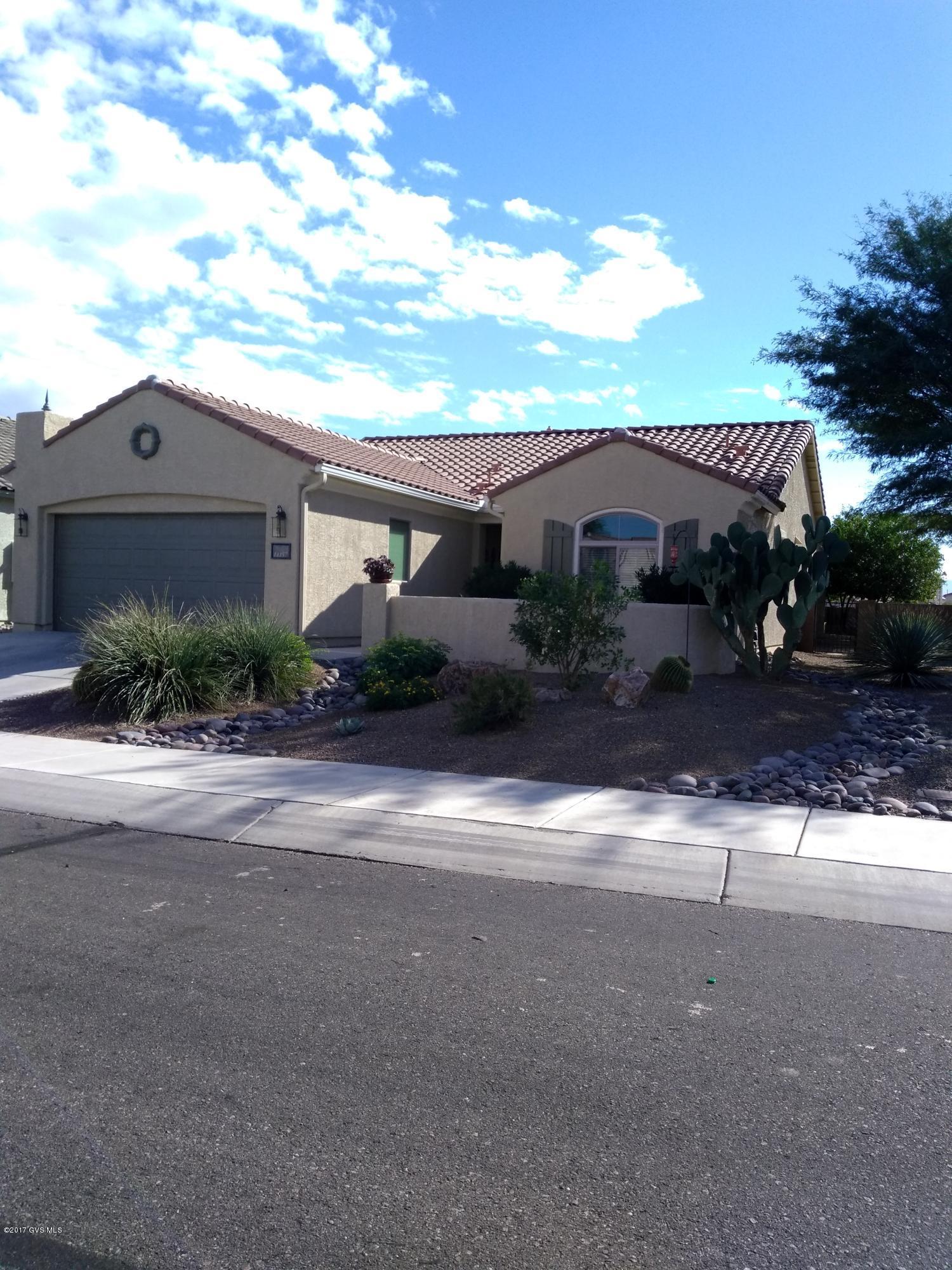 Owner/Agent, Popular Pristine Amado Model 3 BD 2 BA. See this property 1st, lots of upgrades 20K landscaping, open floorplan, split bedrooms, light and bright, decorator items galore, backsplash, tile upgrades, closet systems in guest bdrm and office, sentricon termite system, backyard has huge extended paver patio, kiva fireplace, built in benches and flower bed, corner lot on cul de sac, amazing 55+ Del Webb Community