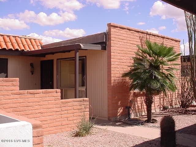 2BR 2BA double carport and a TERRIFIC Mountain view from east Patio. Needs TLC and updating along with ozone treatments.
