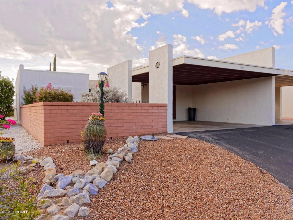 Maybe what you have been looking for? 2 BR, 2BA end unit Townhouse with 2 car carport. Front courtyard and sweeping mountain views from rear patio. Newer kitchen appliances. Tile except bedrooms. Low taxes and no GVR. Convenient location.