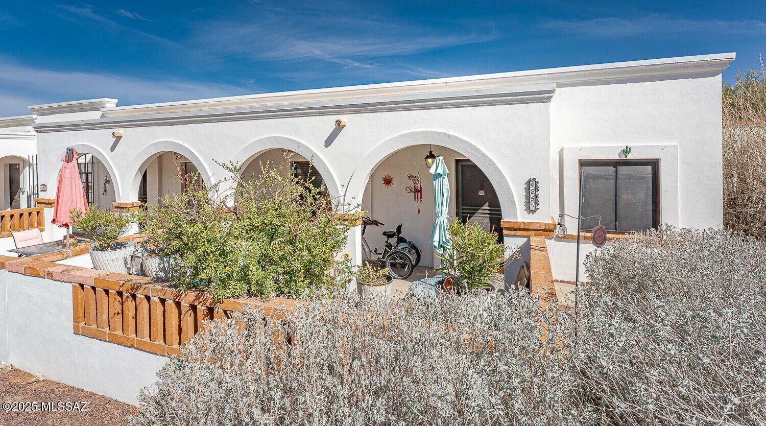 Charming, furnished 2-bedroom Villa with beautiful tile floors throughout. Improvements include newer paint, granite countertops, kitchen bump-out with room for a dining table and full-size washer & dryer in unit. Updated cabinets have pull-outs for easy access. Newer glass shower door for easy access to a full walk-in shower., New roof in December 2022, 4 newer Low-E windows. Great location, close to shopping and restaurants, perfect for year-round or seasonal living. Villas East Association provides HVAC repair or replacement, roof maintenance and repair, common ground maintenance, trash removal, water, sewer, exterior pest control and blanket insurance policy.