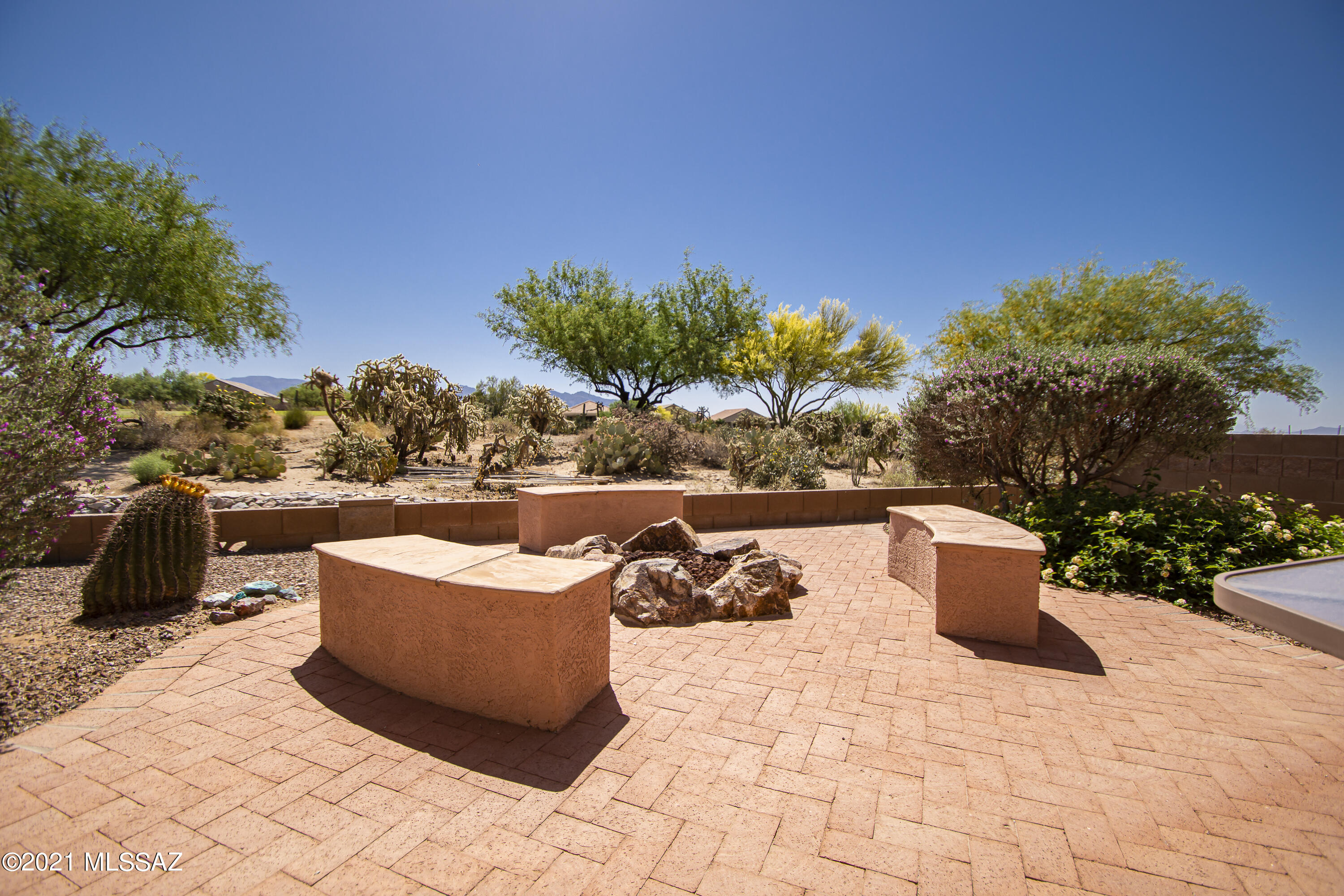 Great value - golf and mountain views. Clean, crisp and move-in-ready. Home only lived in roughly 3-4 months a year. Seasonal rental.  Home is being offered furnished/turn-key for additional $3000.  Private location. New hot water heater installed roughly 2.5 years ago.  Very private and relaxing backyard: fire pit & bench seating area - low care yet mature desert landscape. Wonderful east facing backyard mountain and golf course views from this open Keystone model. Home is bright and cheery and ready for your own personal touches.   Home would make a great year around or seasonal rental - especially with all the furnishes and accessories + dishes, etc. available. Call for private showing.